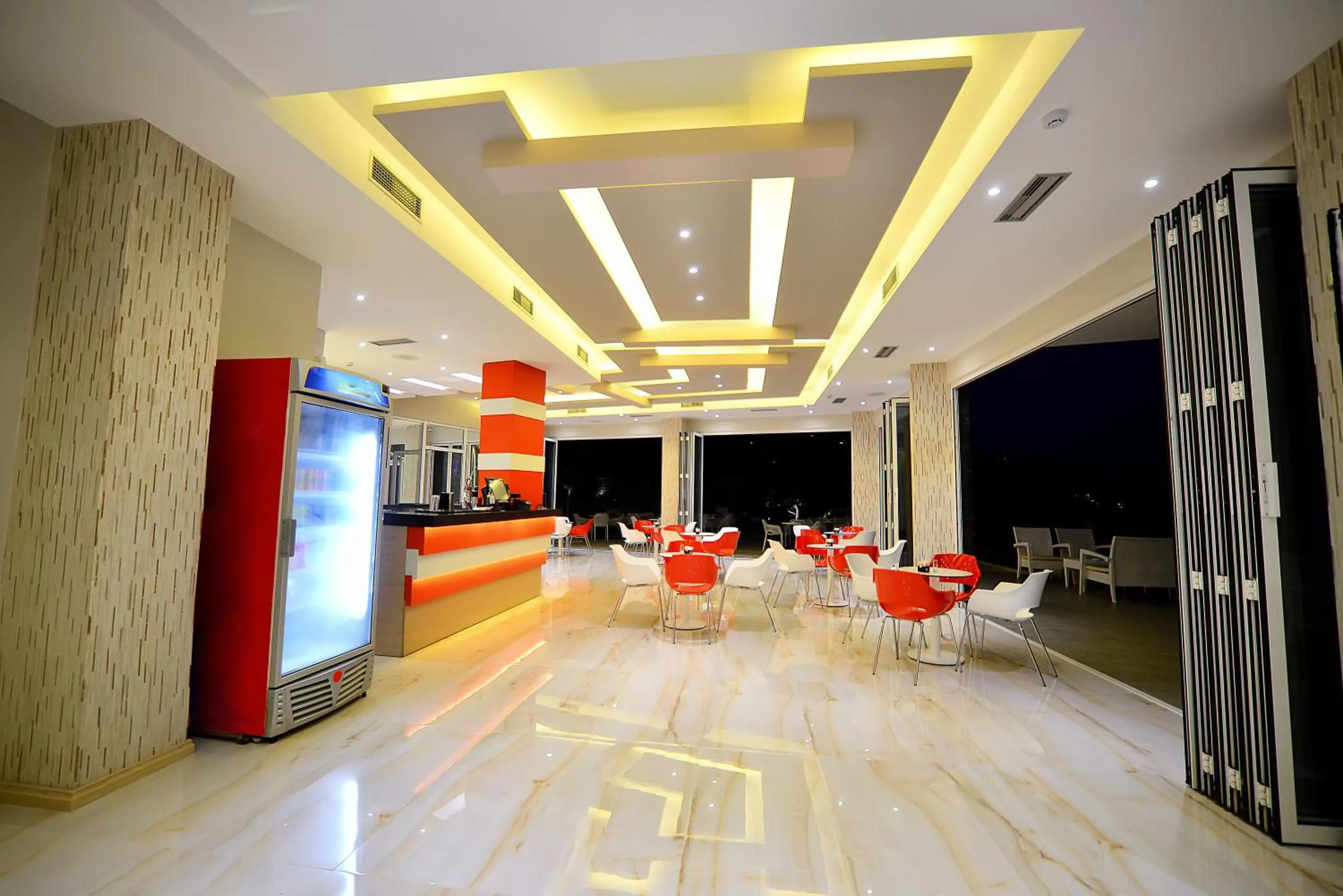 Communal lounge/ TV room in Elysium Hotel