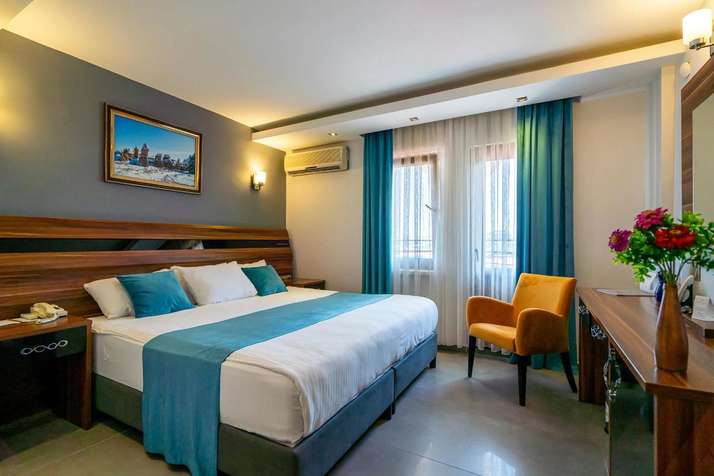 Bed in SIGNATURE GARDEN AVANOS Hotel & SPA