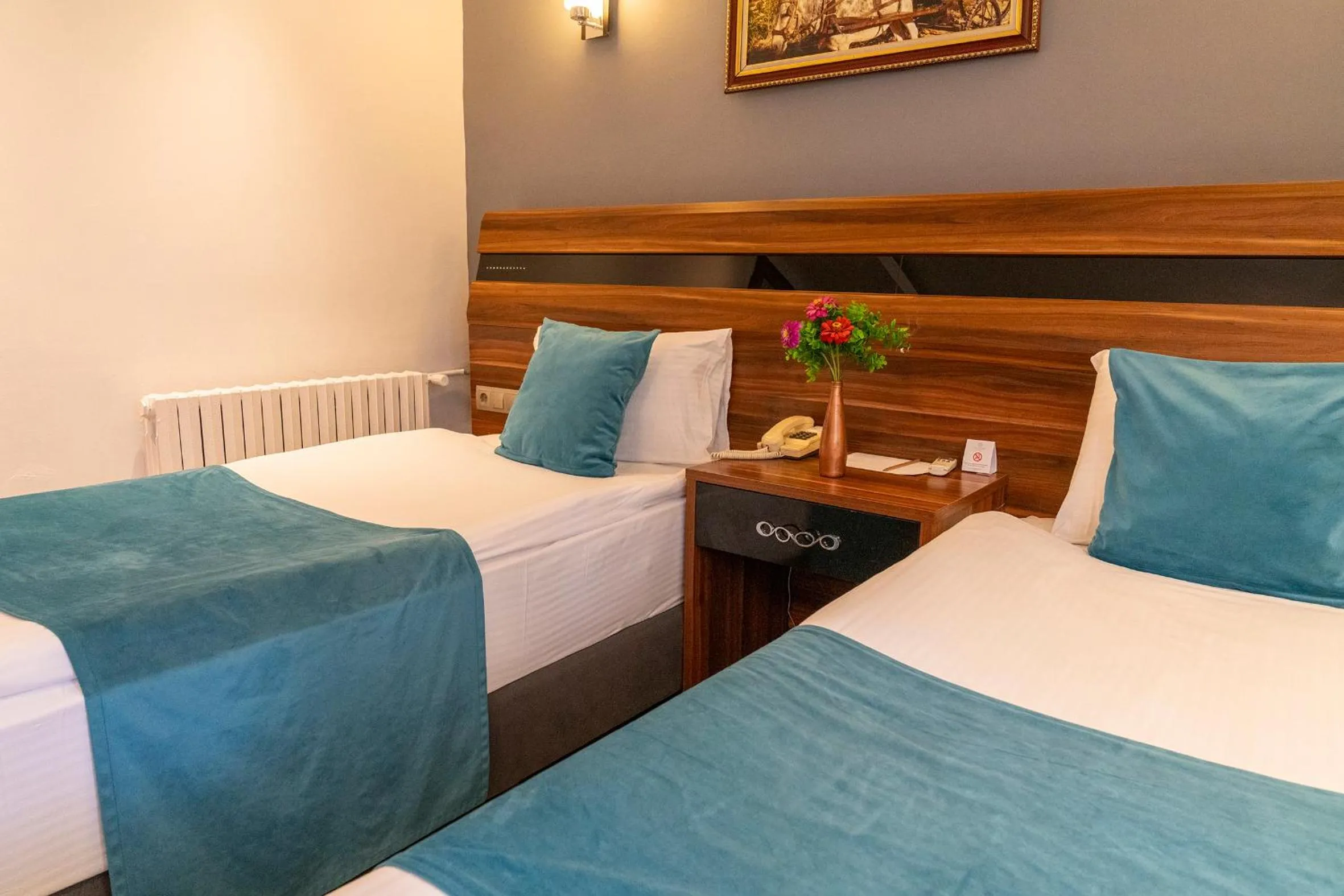 Bed in SIGNATURE GARDEN AVANOS Hotel & SPA