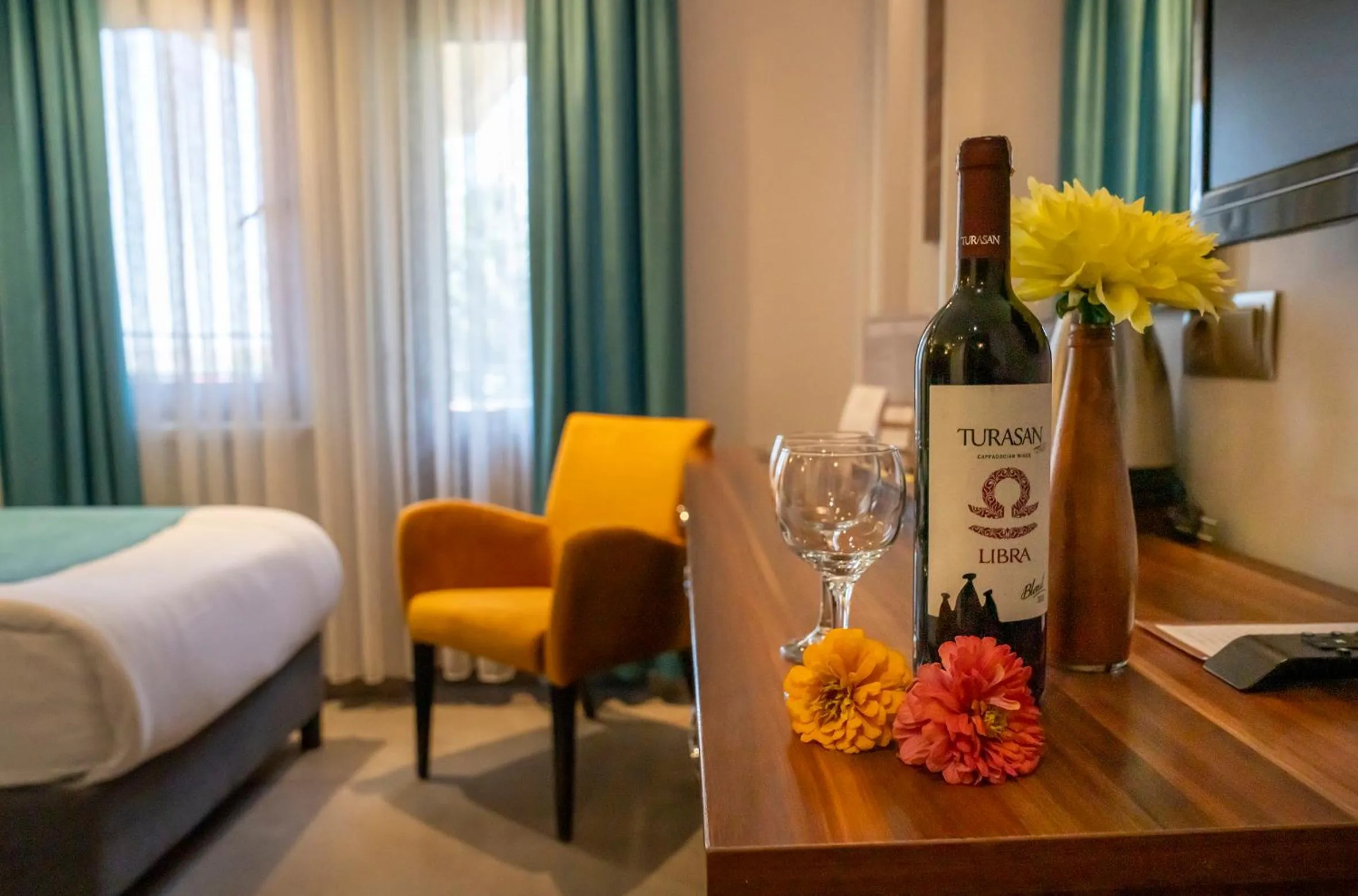 Bed in SIGNATURE GARDEN AVANOS Hotel & SPA