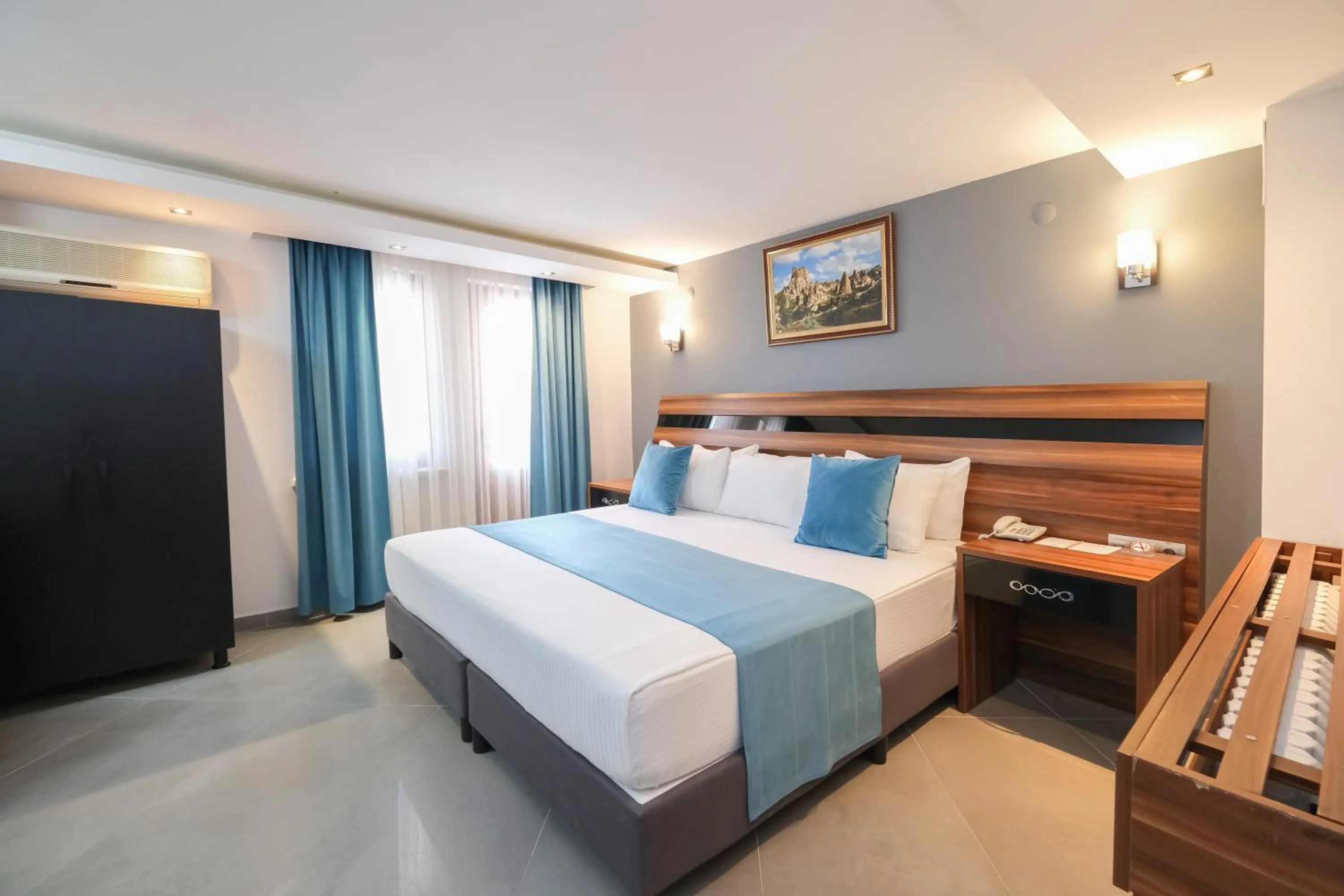 Bed in SIGNATURE GARDEN AVANOS Hotel & SPA