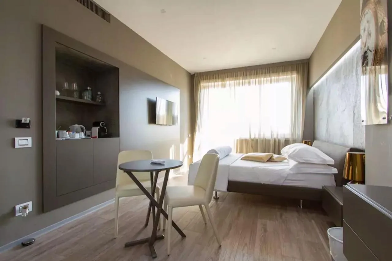 Bed in Ginevra Rooms