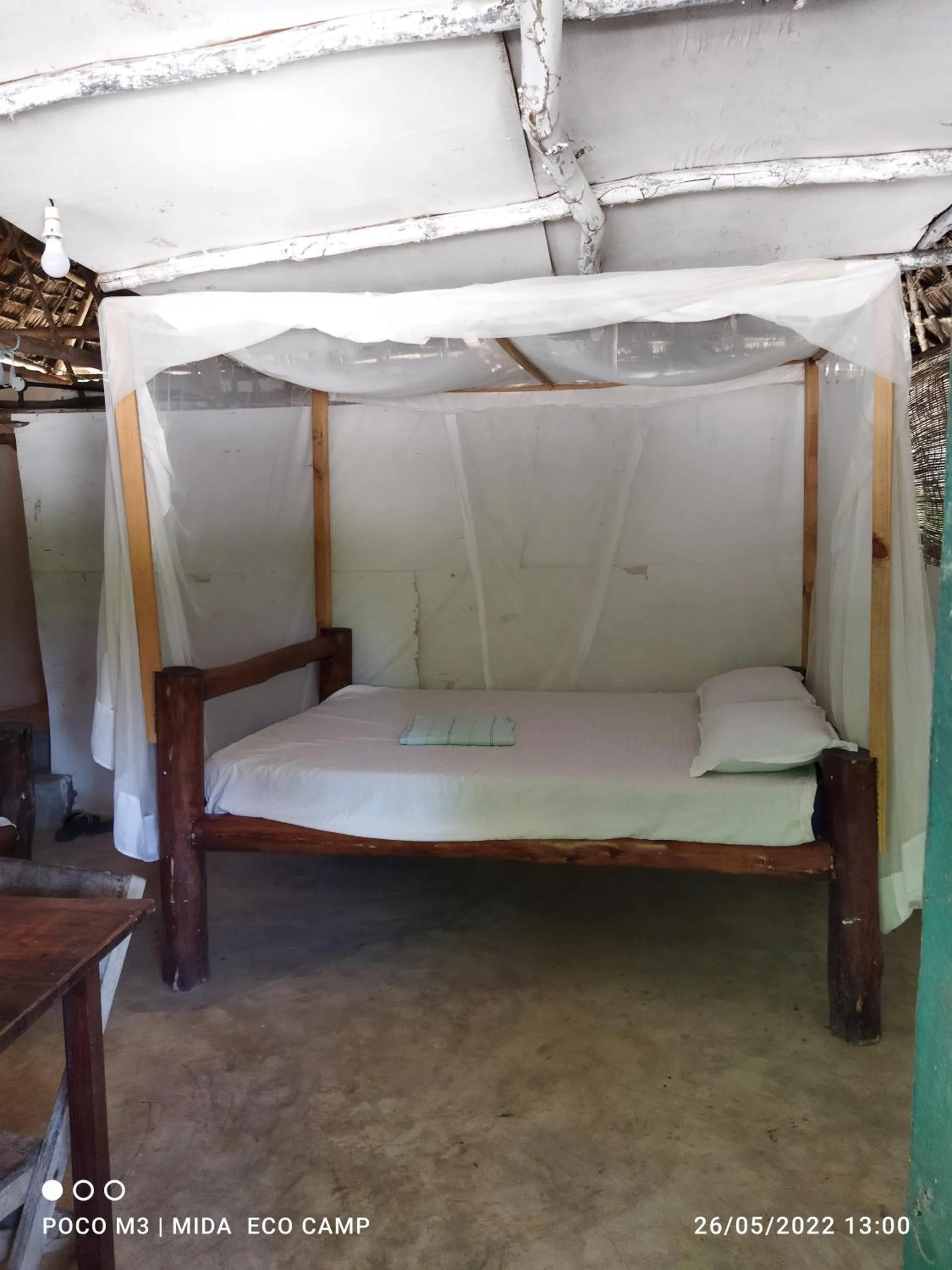 Bed in Mida Creek Eco Camp