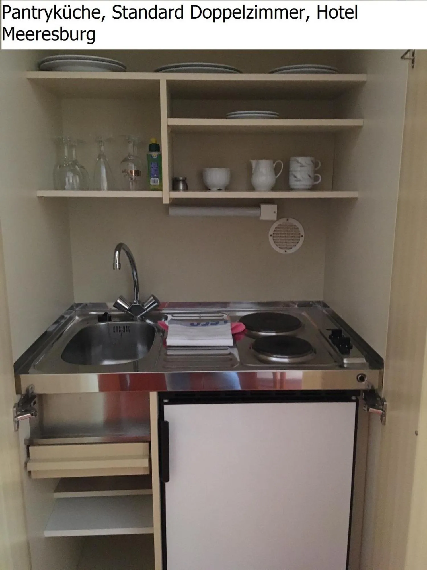 Kitchen or kitchenette in Hotel Meeresburg