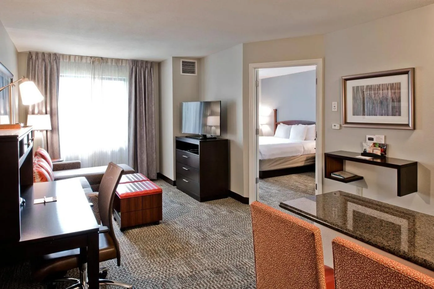 Living room, Bed in Staybridge Suites - Charlotte Ballantyne by IHG