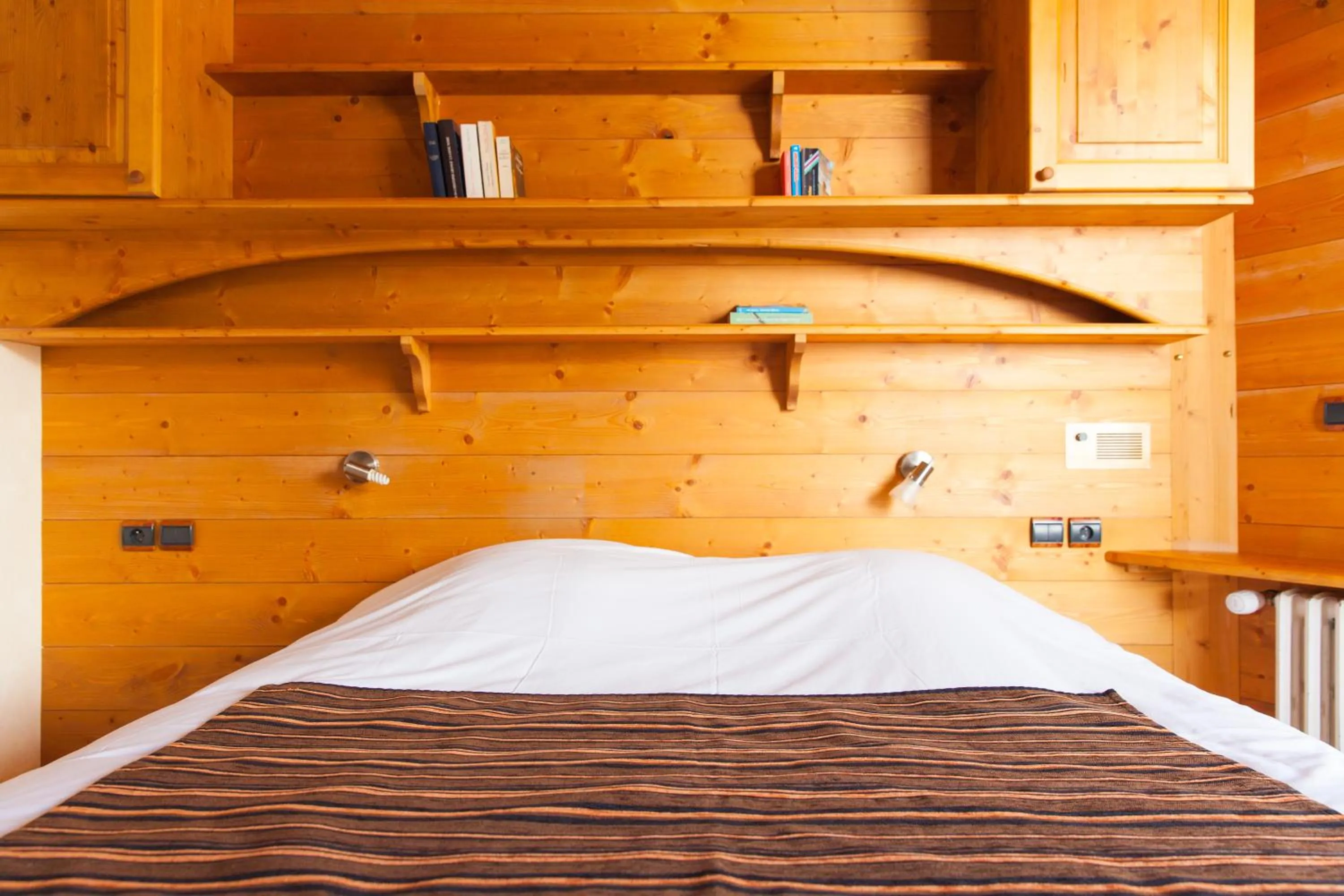 Bed in Hôtel La Vanoise