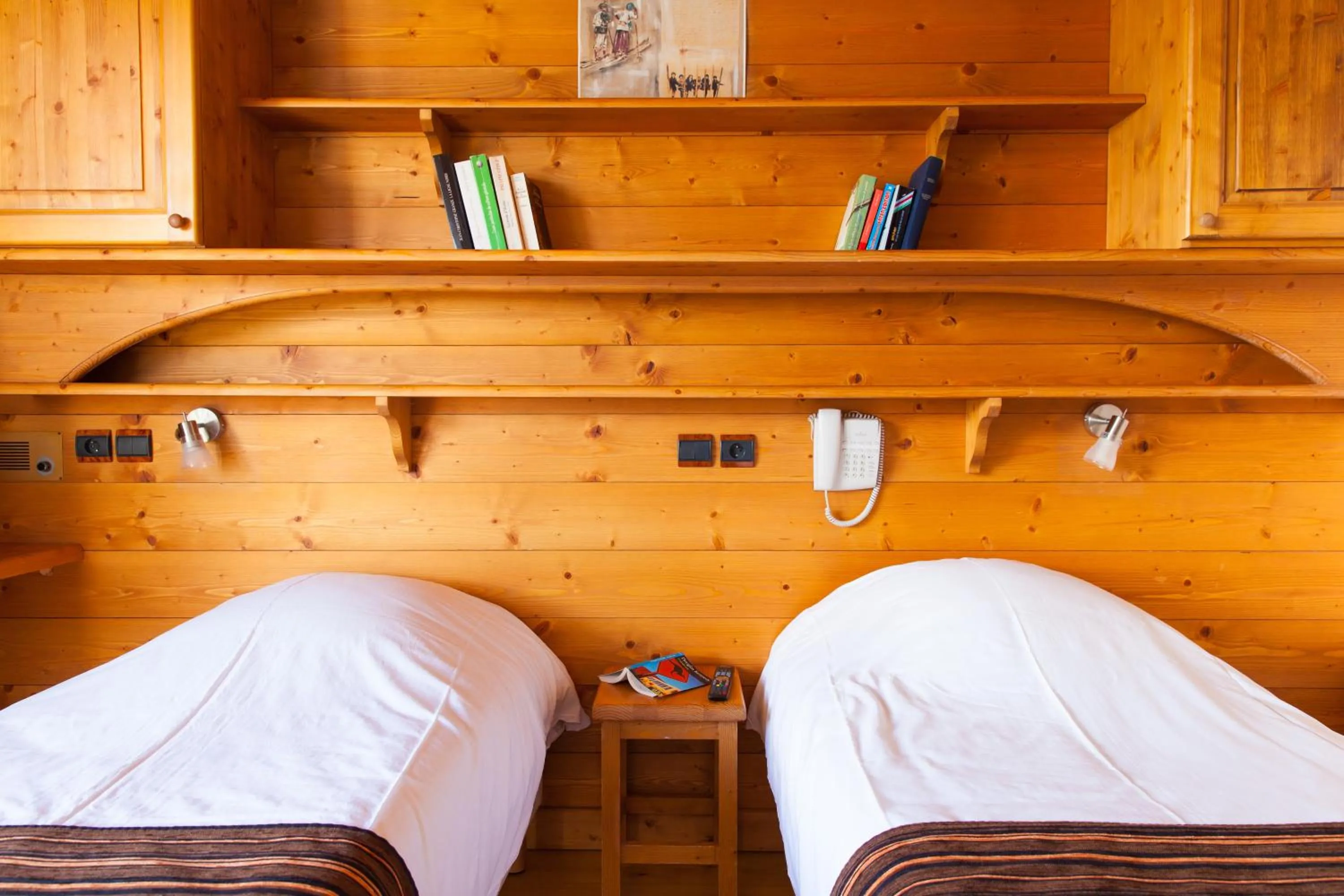 Bed in Hôtel La Vanoise
