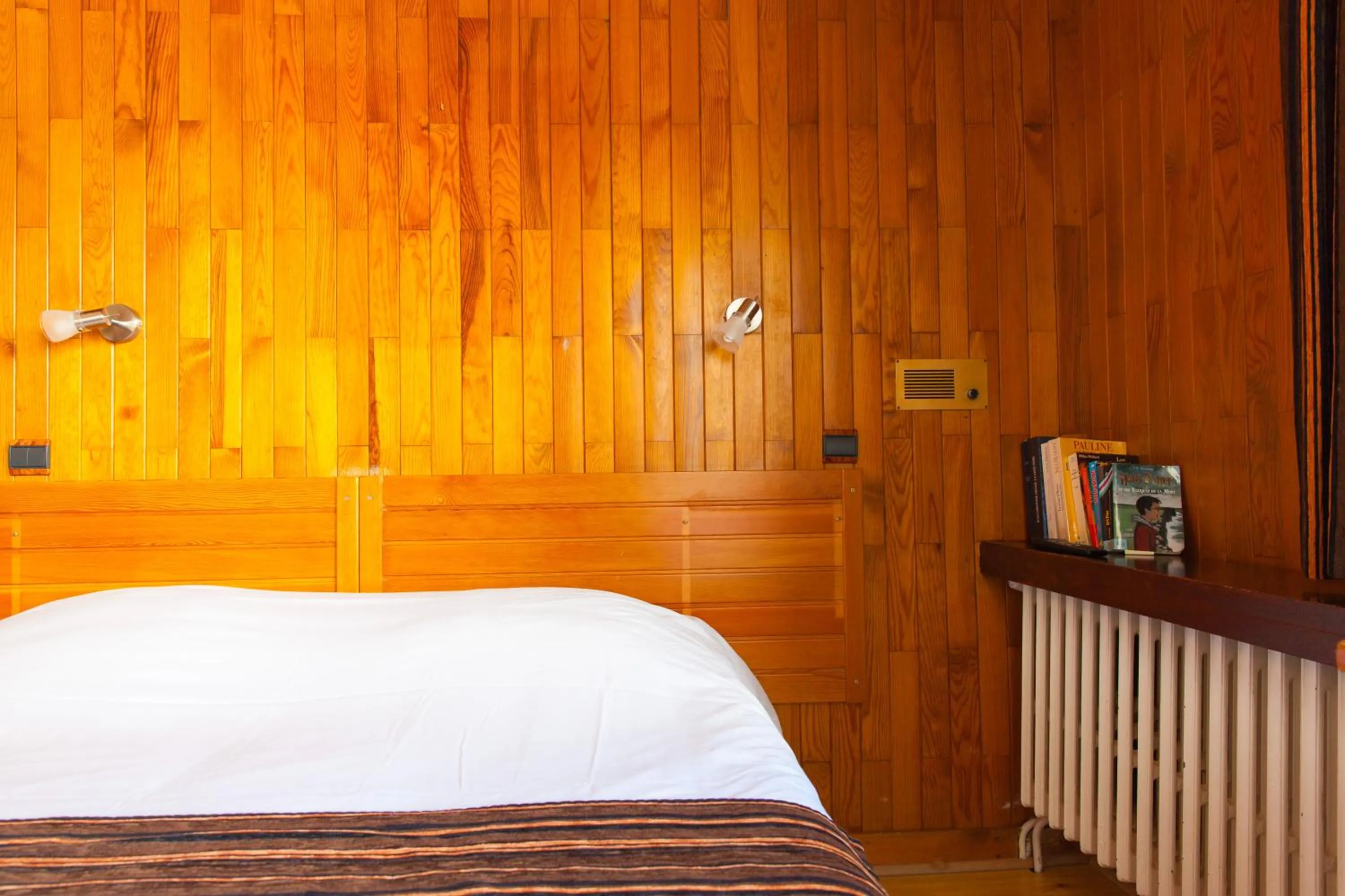 Bed in Hôtel La Vanoise