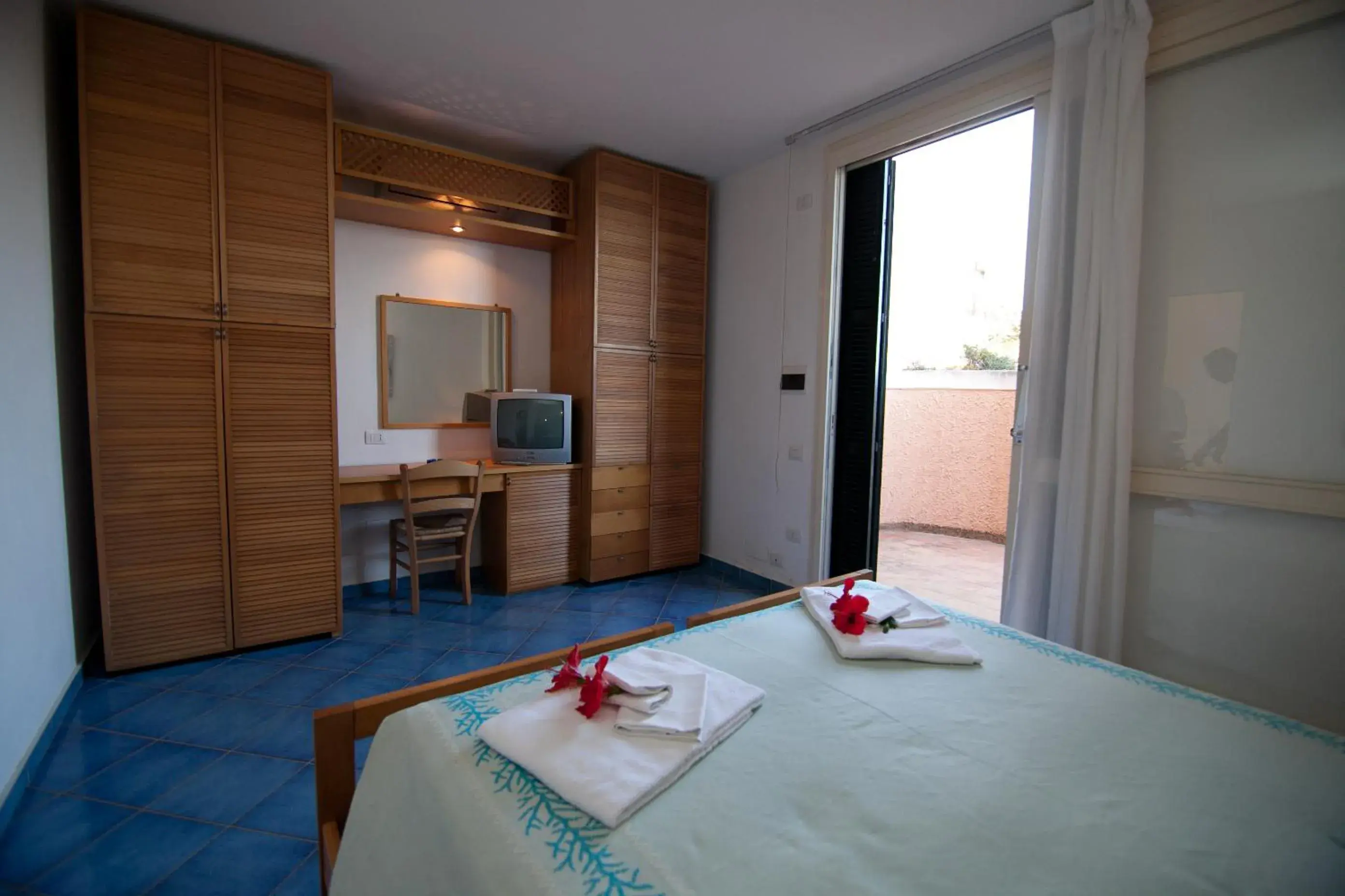 Photo of the whole room, Bed in Club Esse Roccaruja Photo of the whole room, Bed in Club Esse Roccaruja