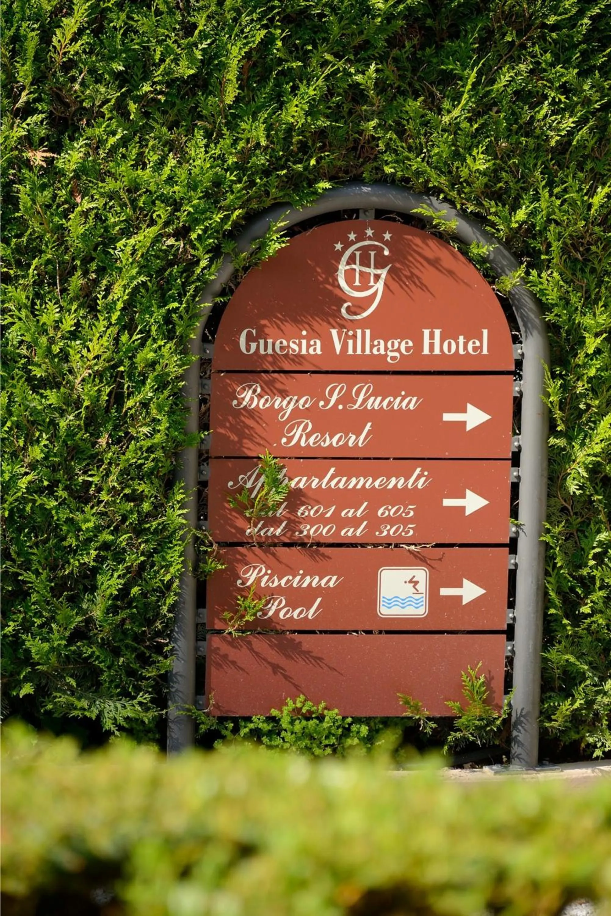Property logo or sign in Guesia Village Hotel e Spa