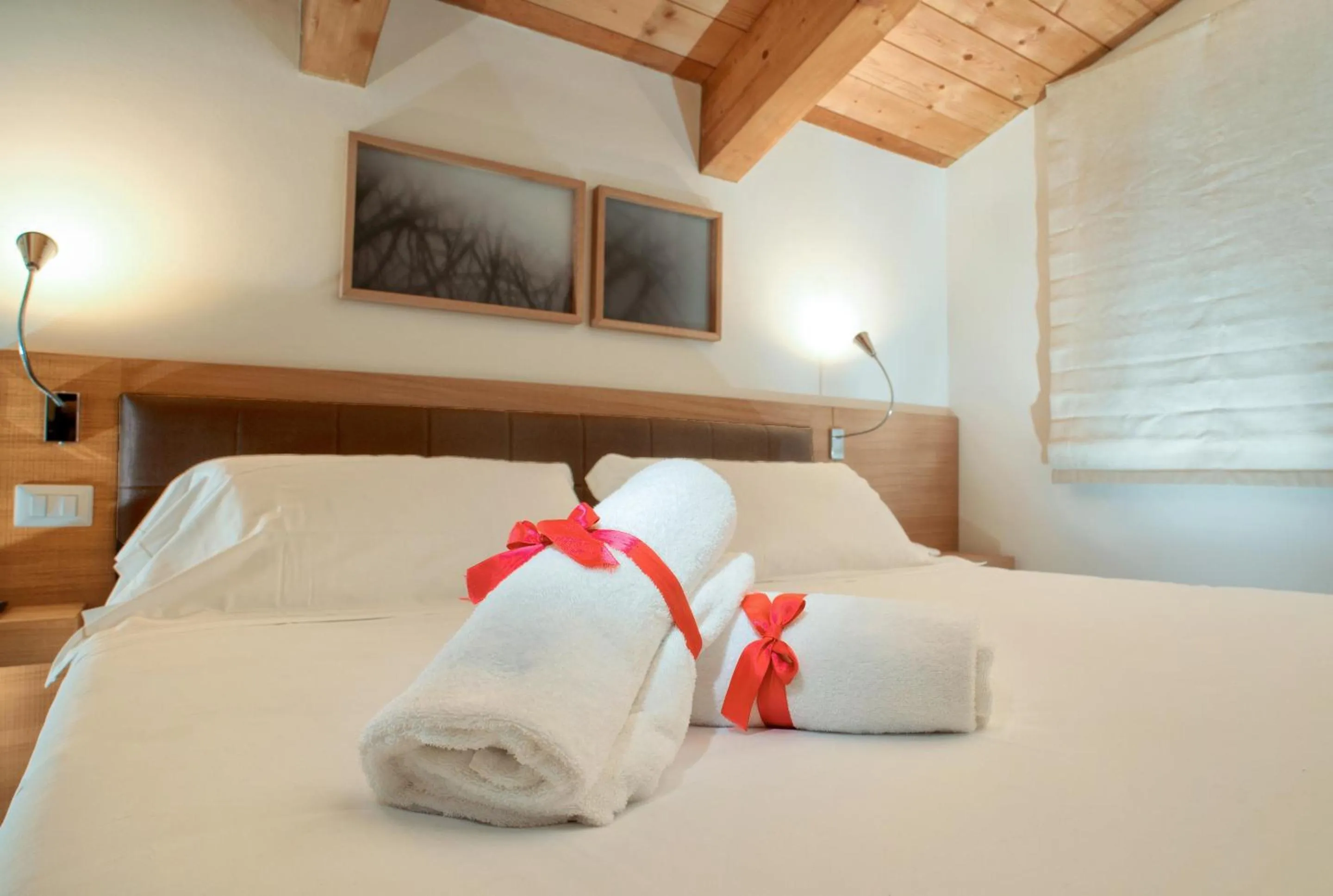 Bed in Guesia Village Hotel e Spa