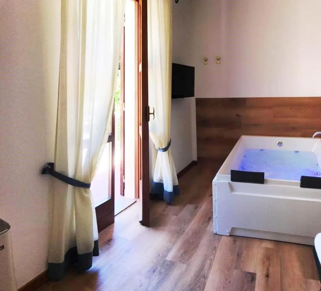 Bed in Guesia Village Hotel e Spa