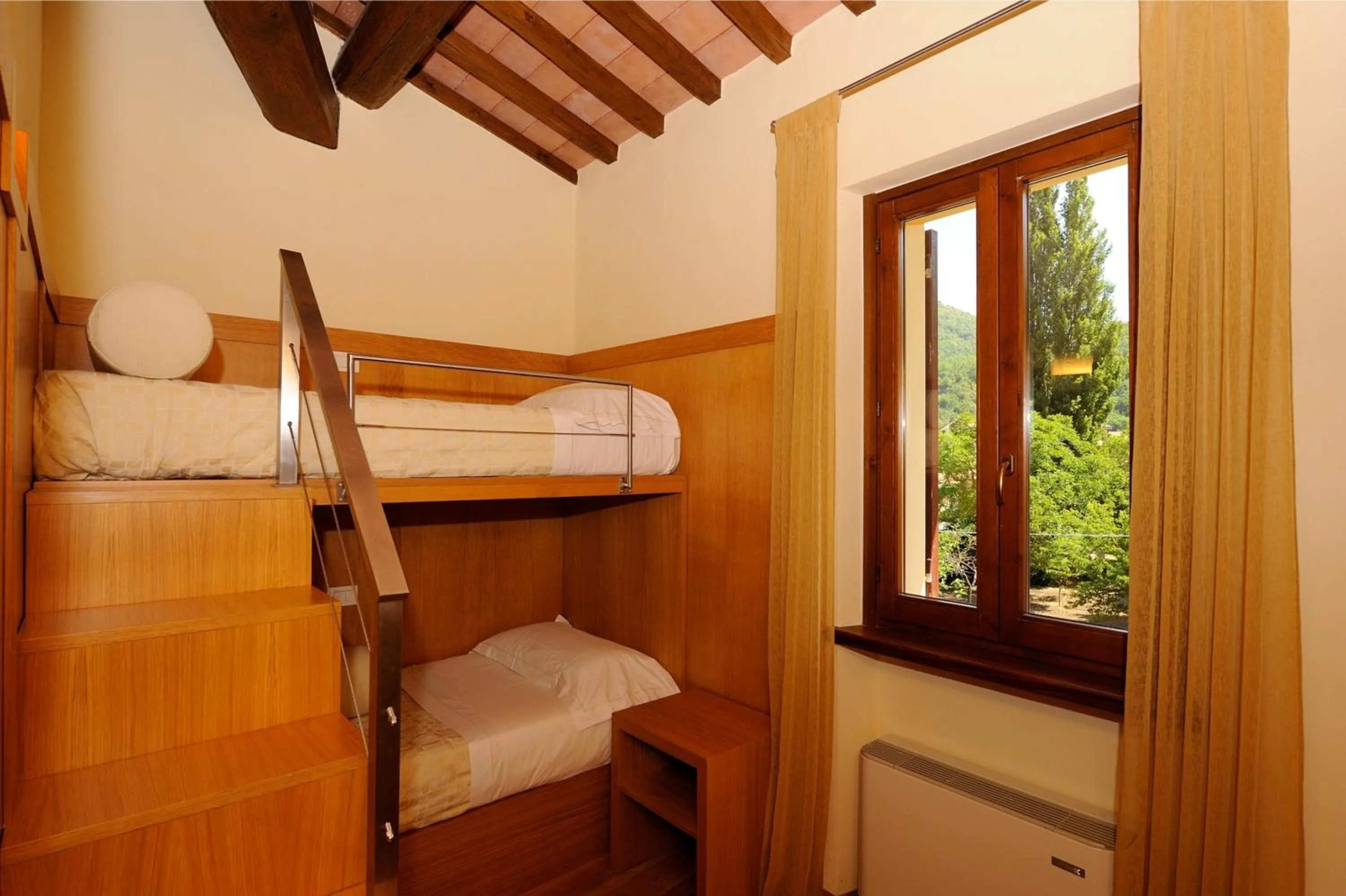 Bed in Guesia Village Hotel e Spa