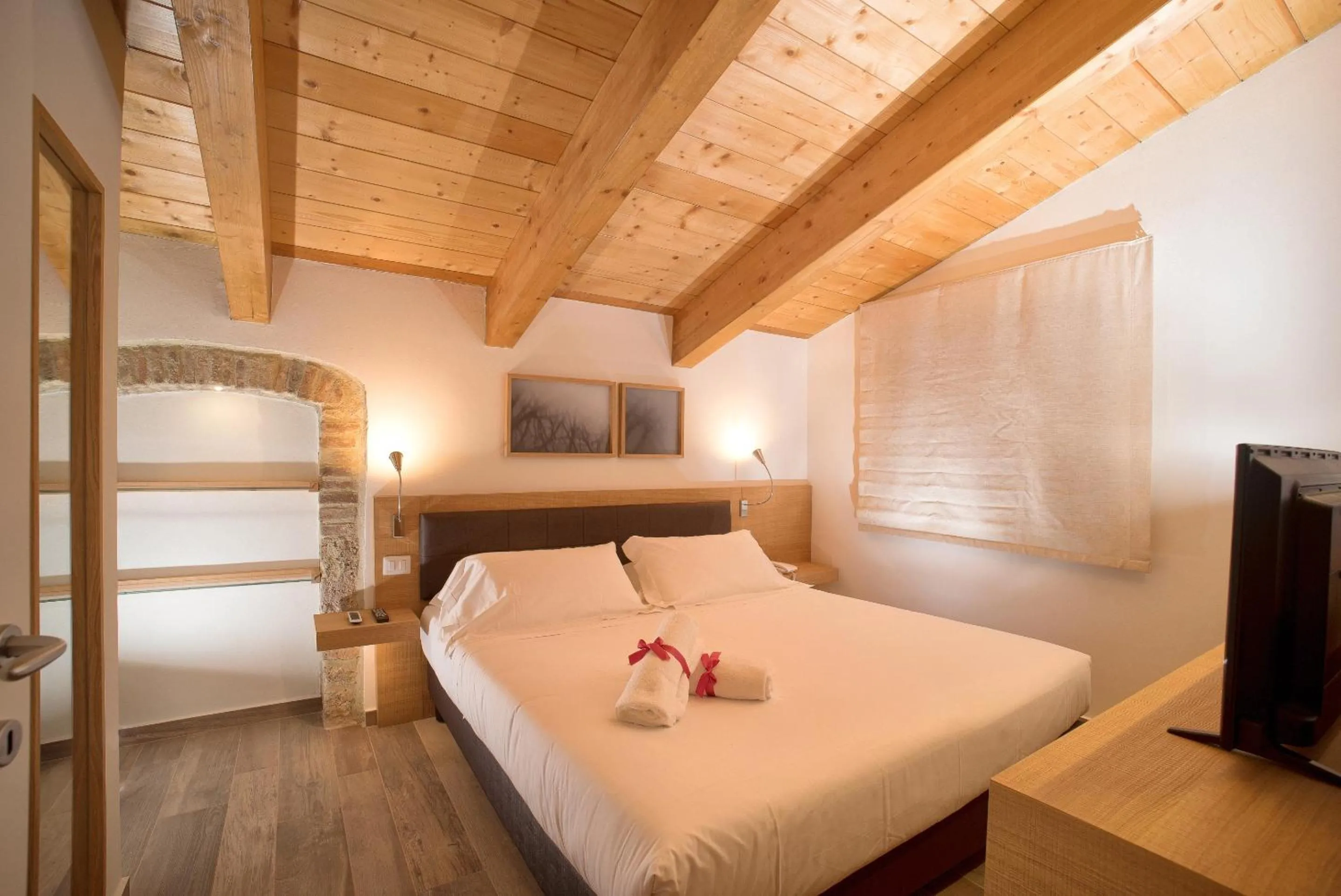 Bed in Guesia Village Hotel e Spa