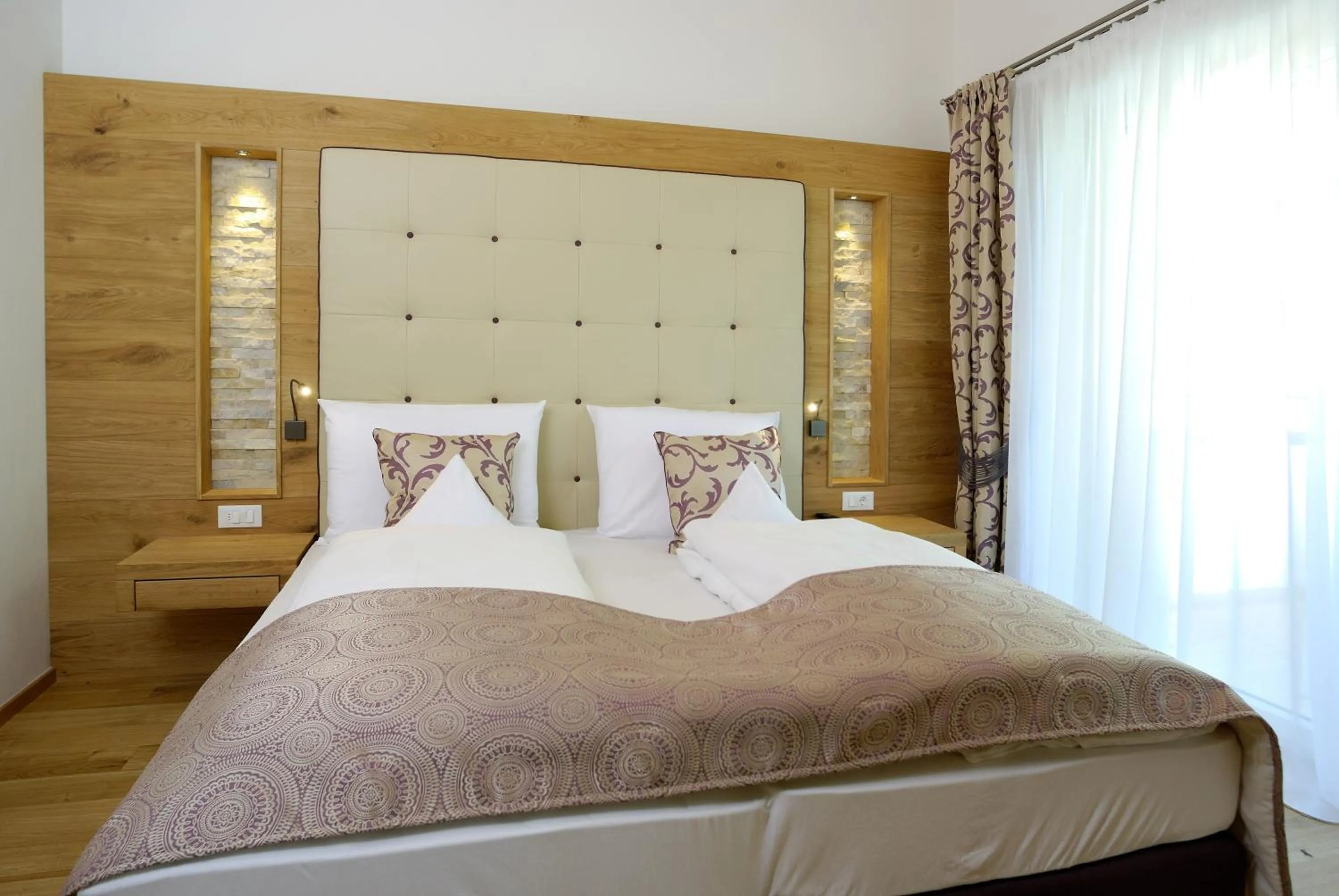 Bed in Stroblhof Active Family Spa Resort