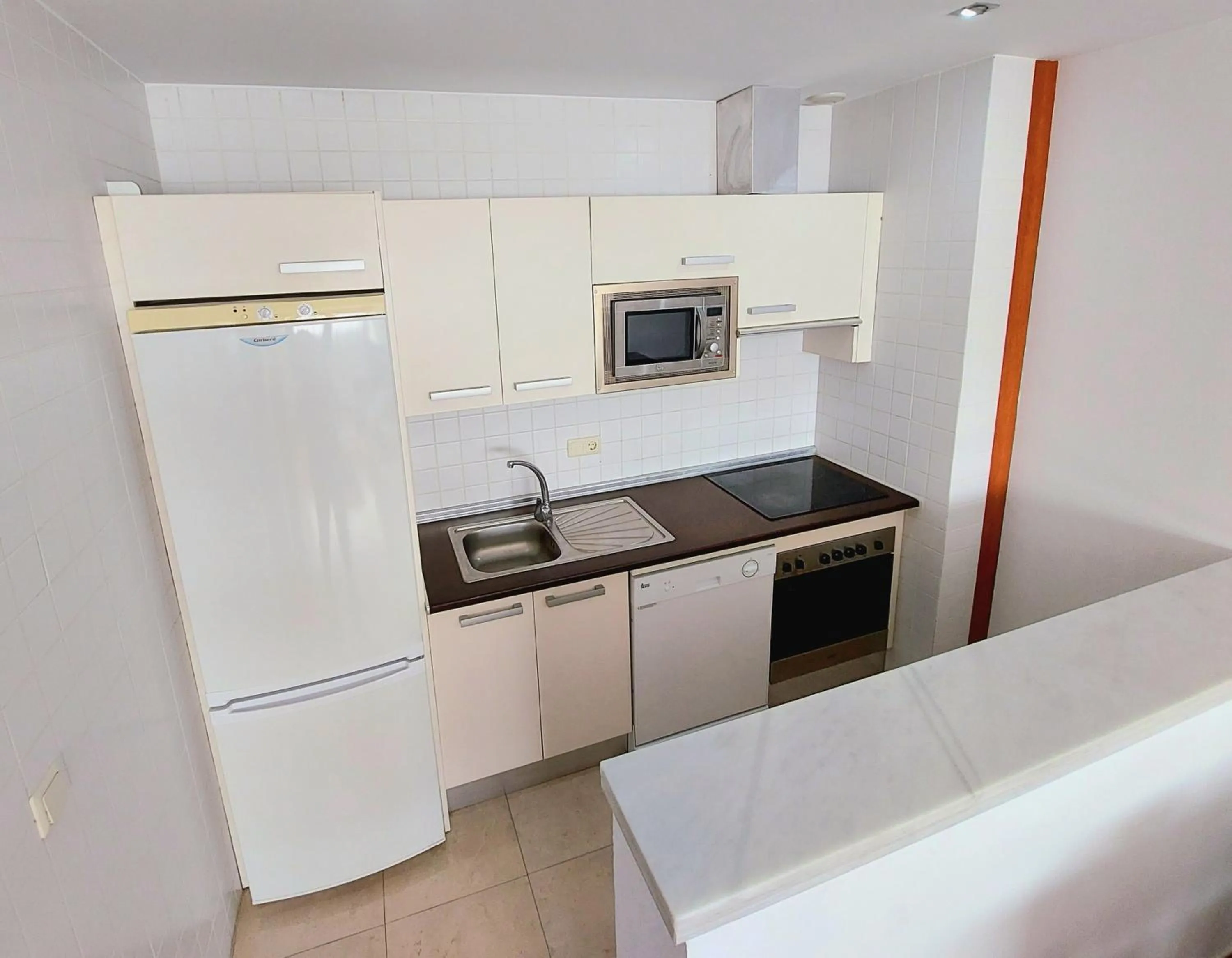 Kitchen or kitchenette in Domocenter Apartamentos Turísticos