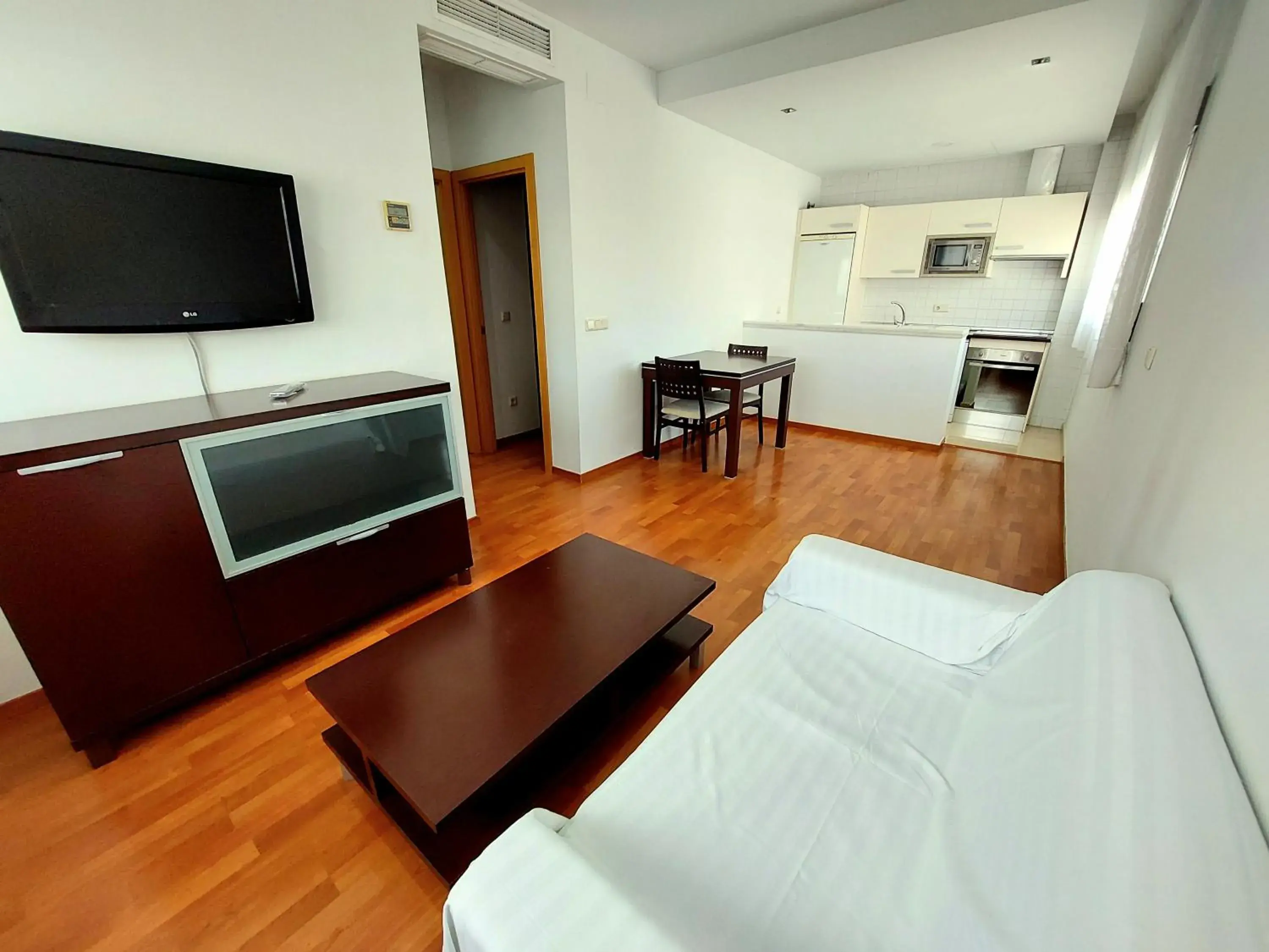 Kitchen or kitchenette, Bed in Domocenter Apartamentos Turísticos Kitchen or kitchenette, Bed in Domocenter Apartamentos Turísticos