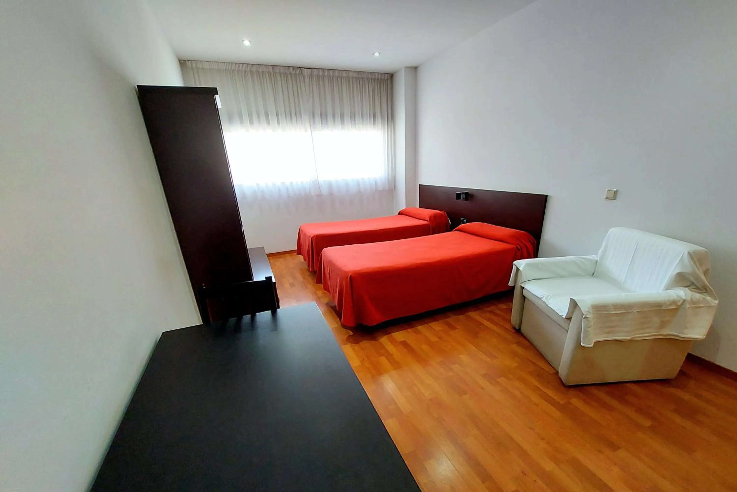 Bedroom, Bed in Domocenter Apartamentos Turísticos