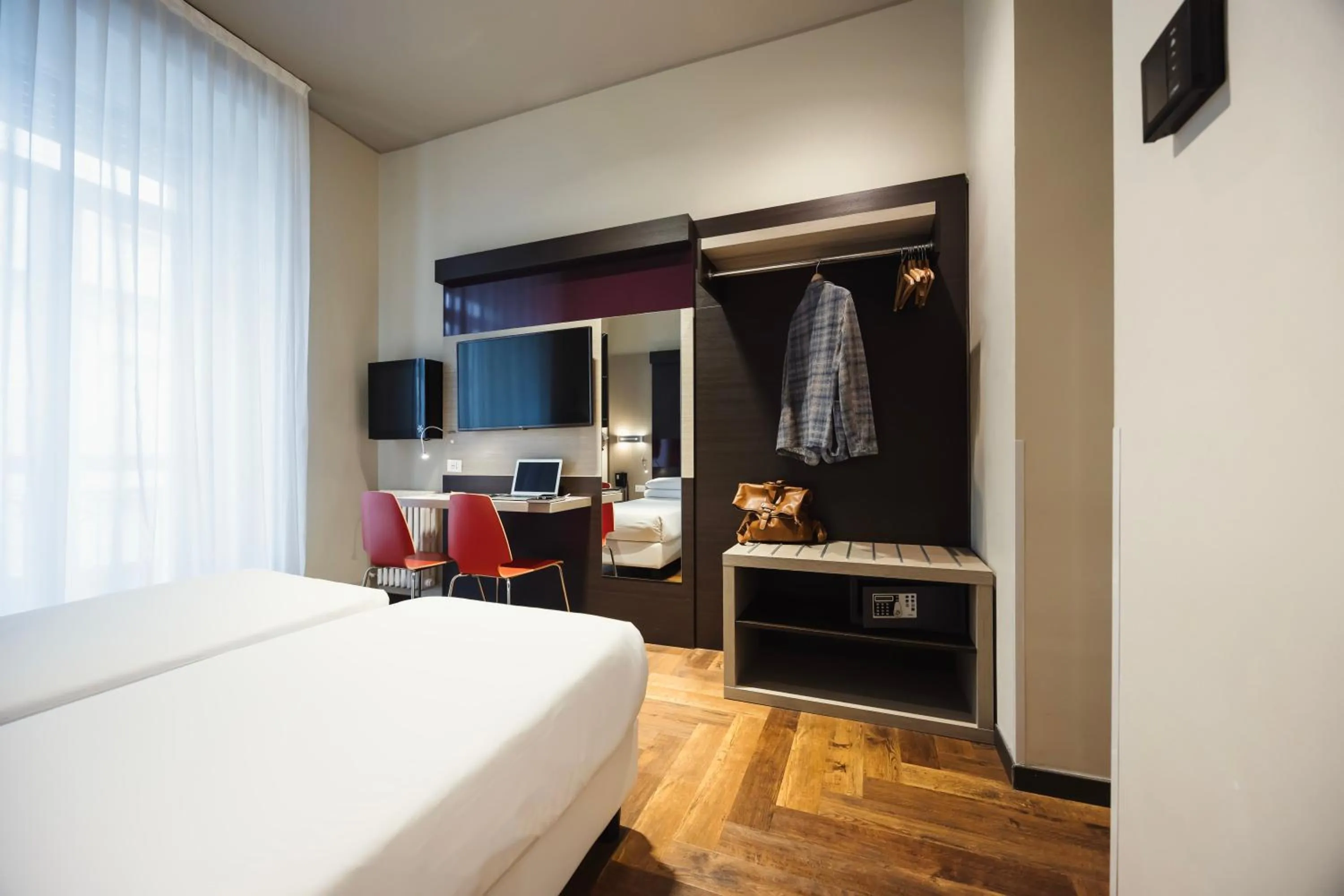 Bed in Genius Hotel Downtown