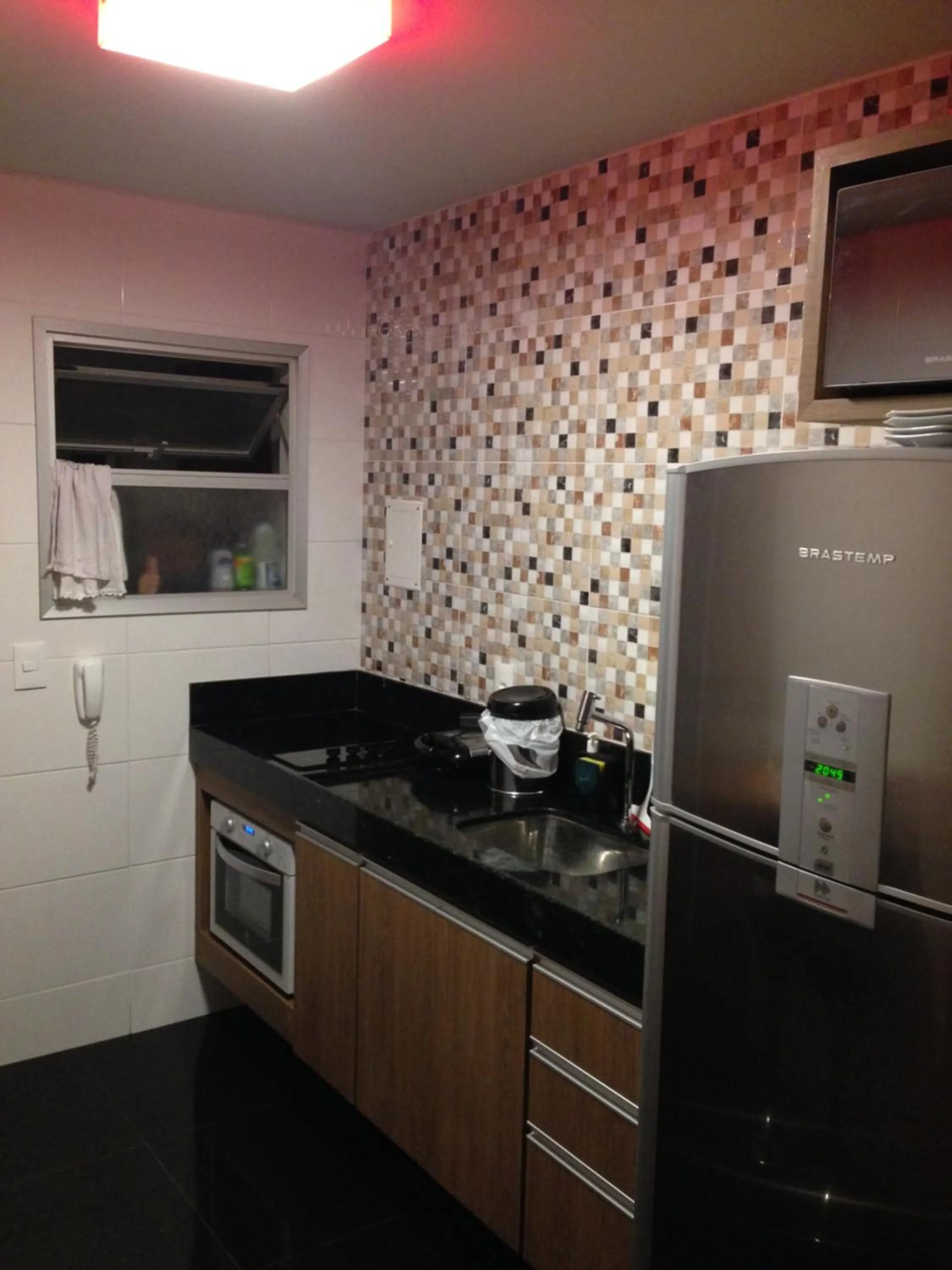 Communal kitchen in Apartamento Guarapari Luxo Frente para o Mar