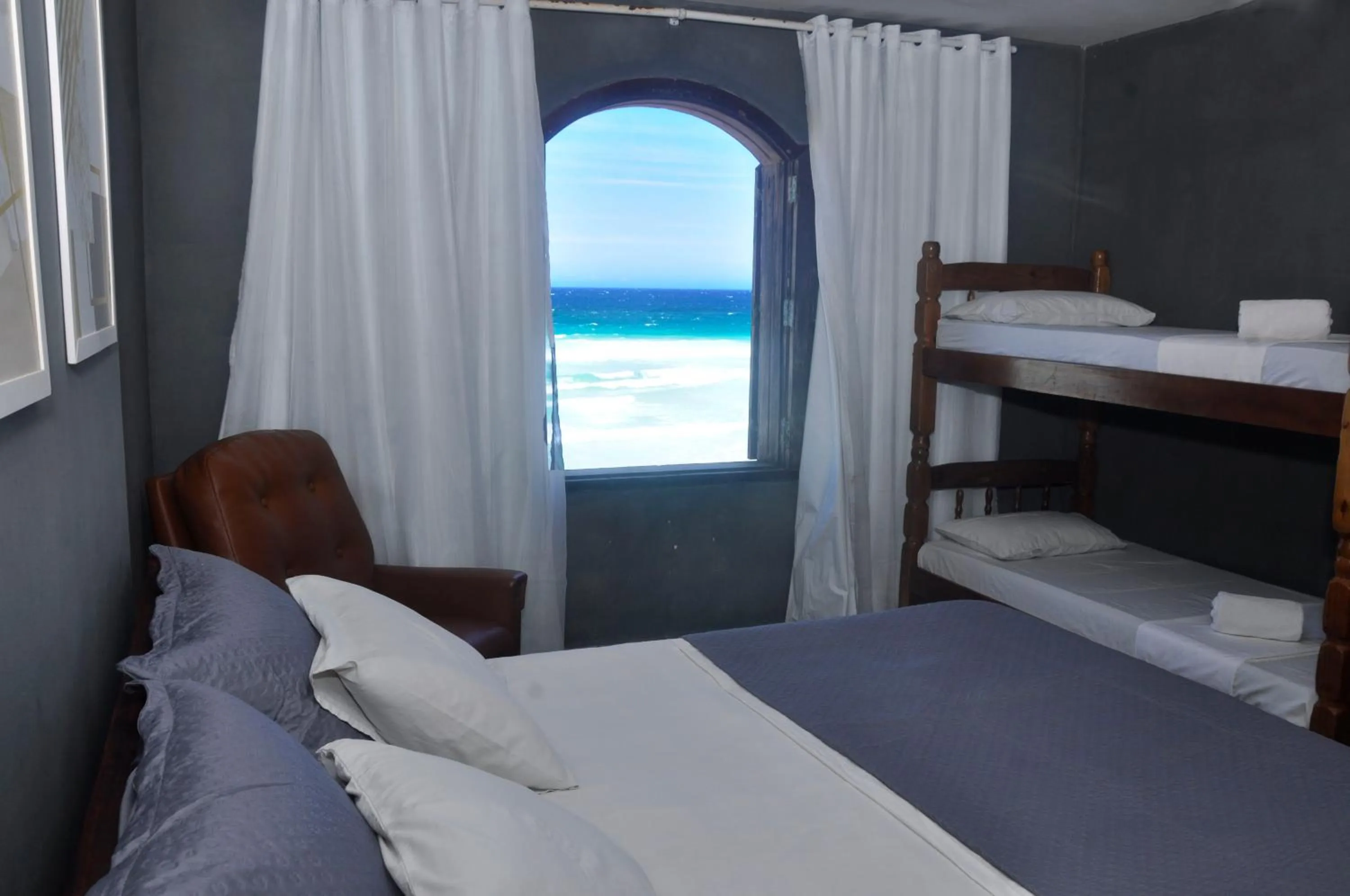 Bed in Pousada My House Cabo Frio