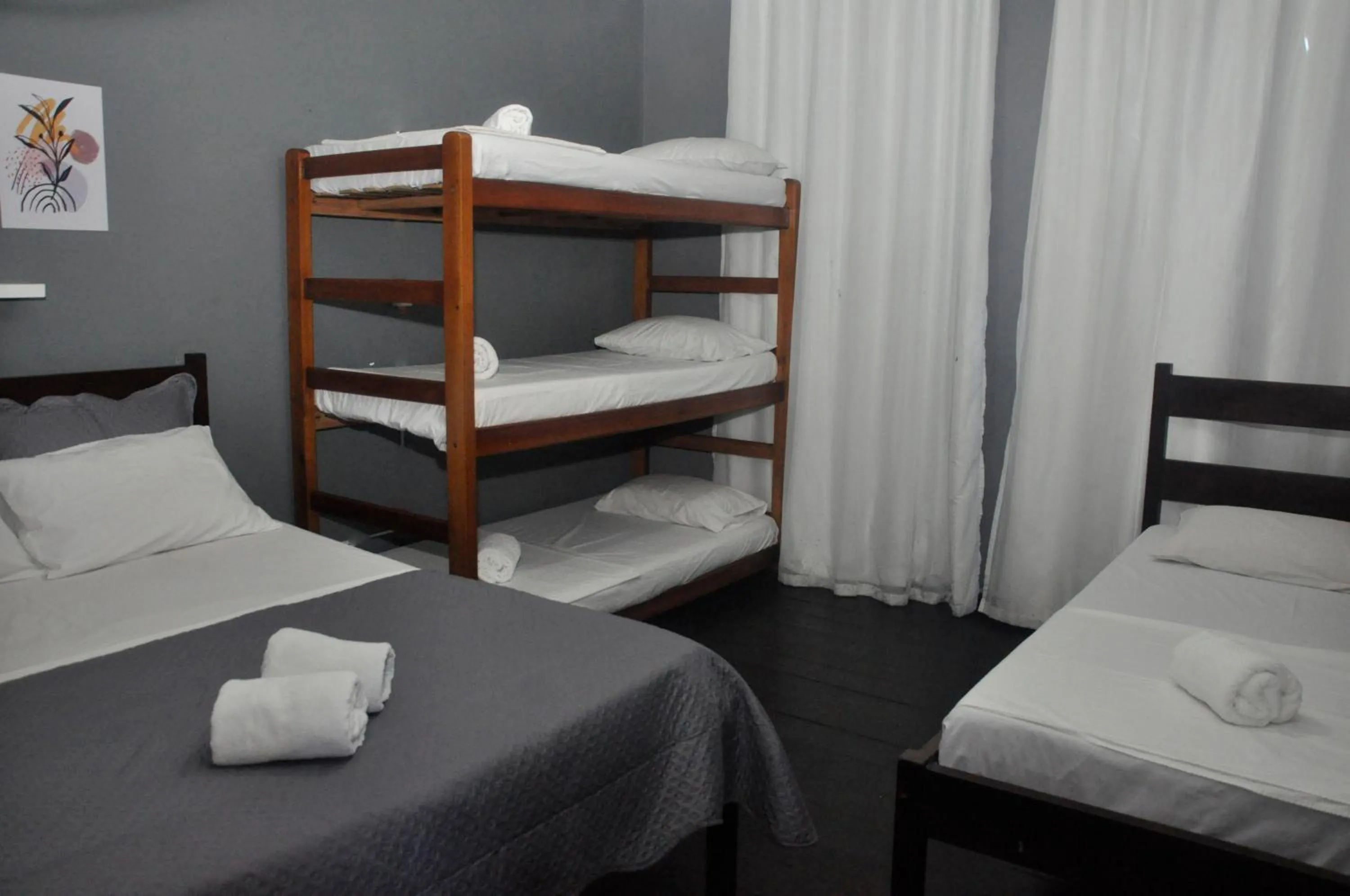 Bed in Pousada My House Cabo Frio