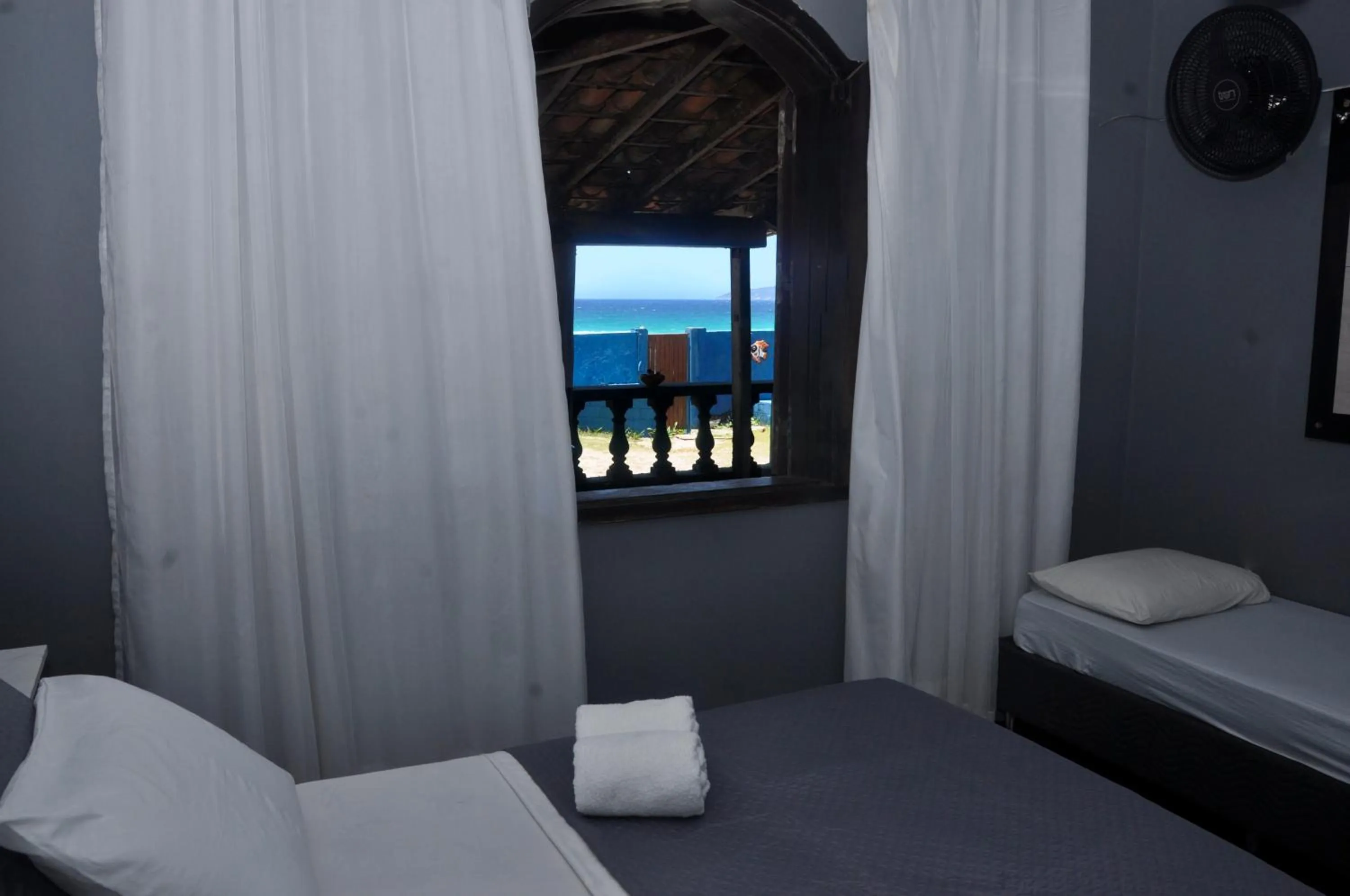 Bed in Pousada My House Cabo Frio