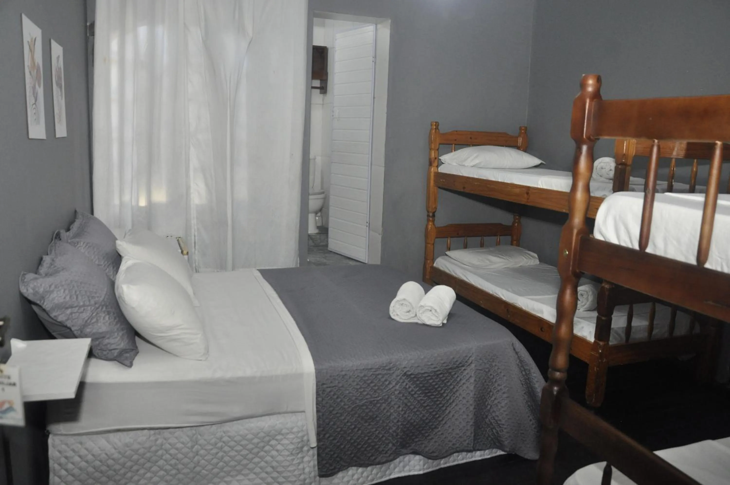 Bed in Pousada My House Cabo Frio