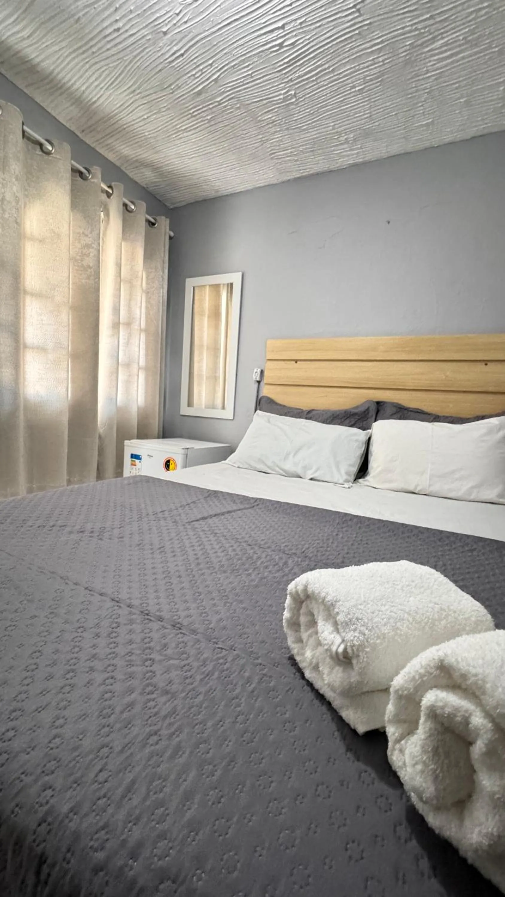 Bed in Pousada My House Cabo Frio