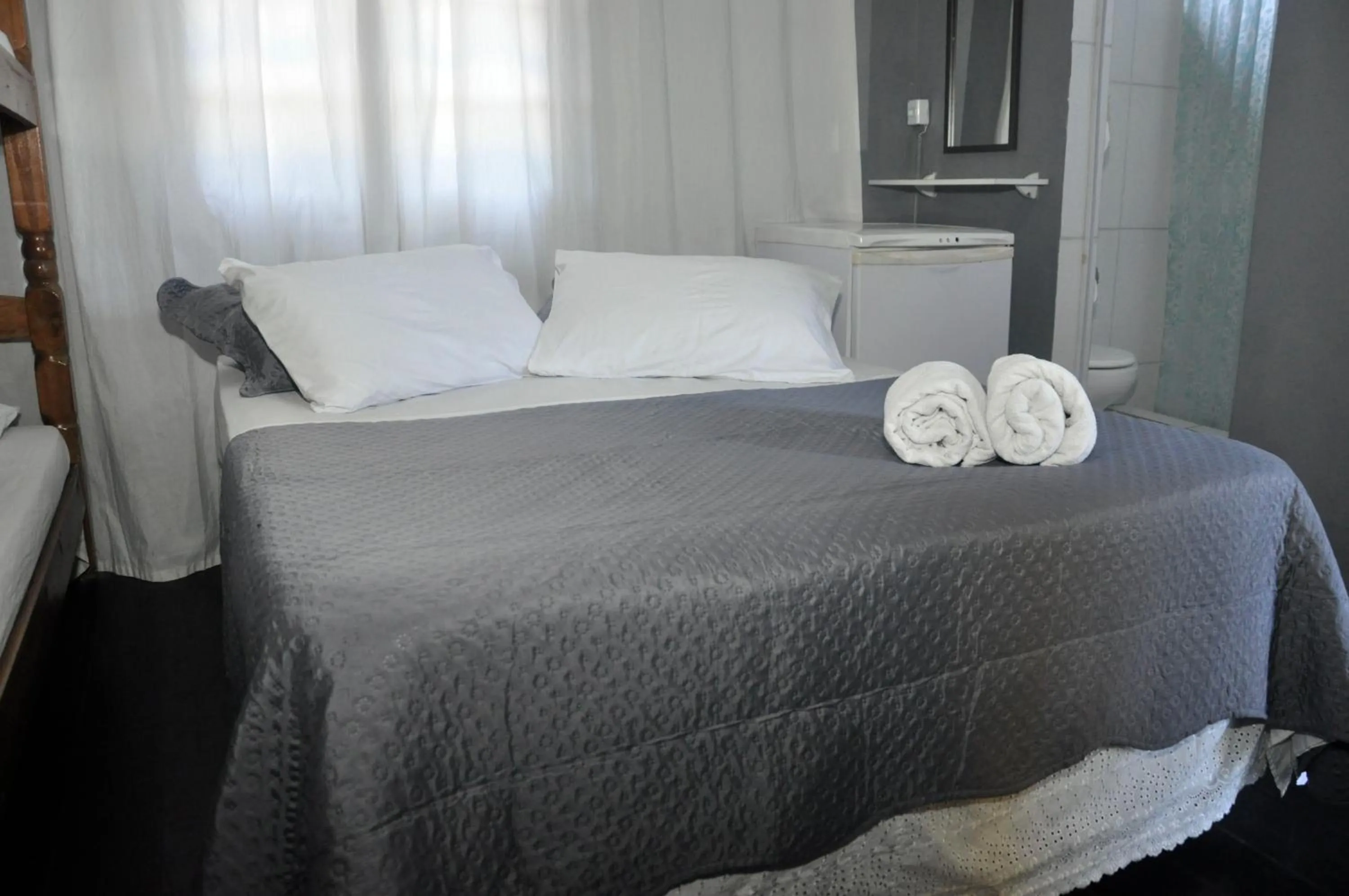 Bed in Pousada My House Cabo Frio