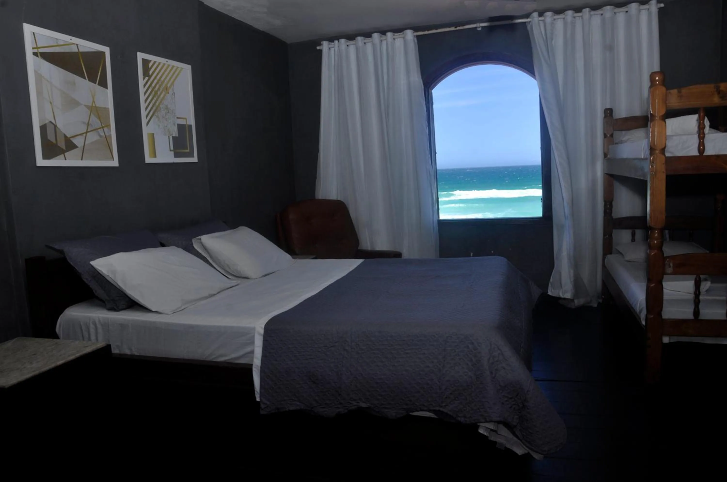 Bed in Pousada My House Cabo Frio