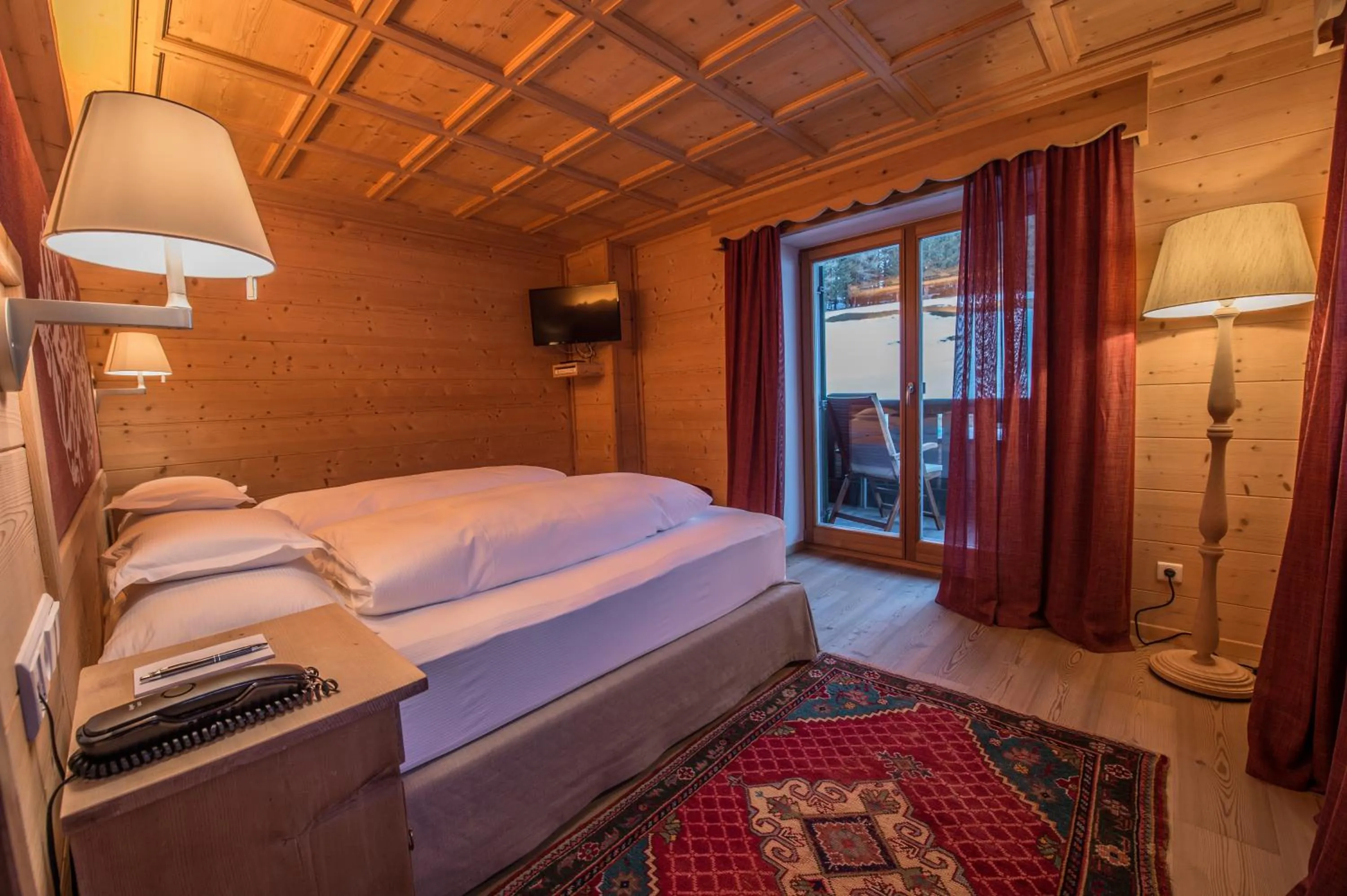 Bed in Hotel Ciasa Salares