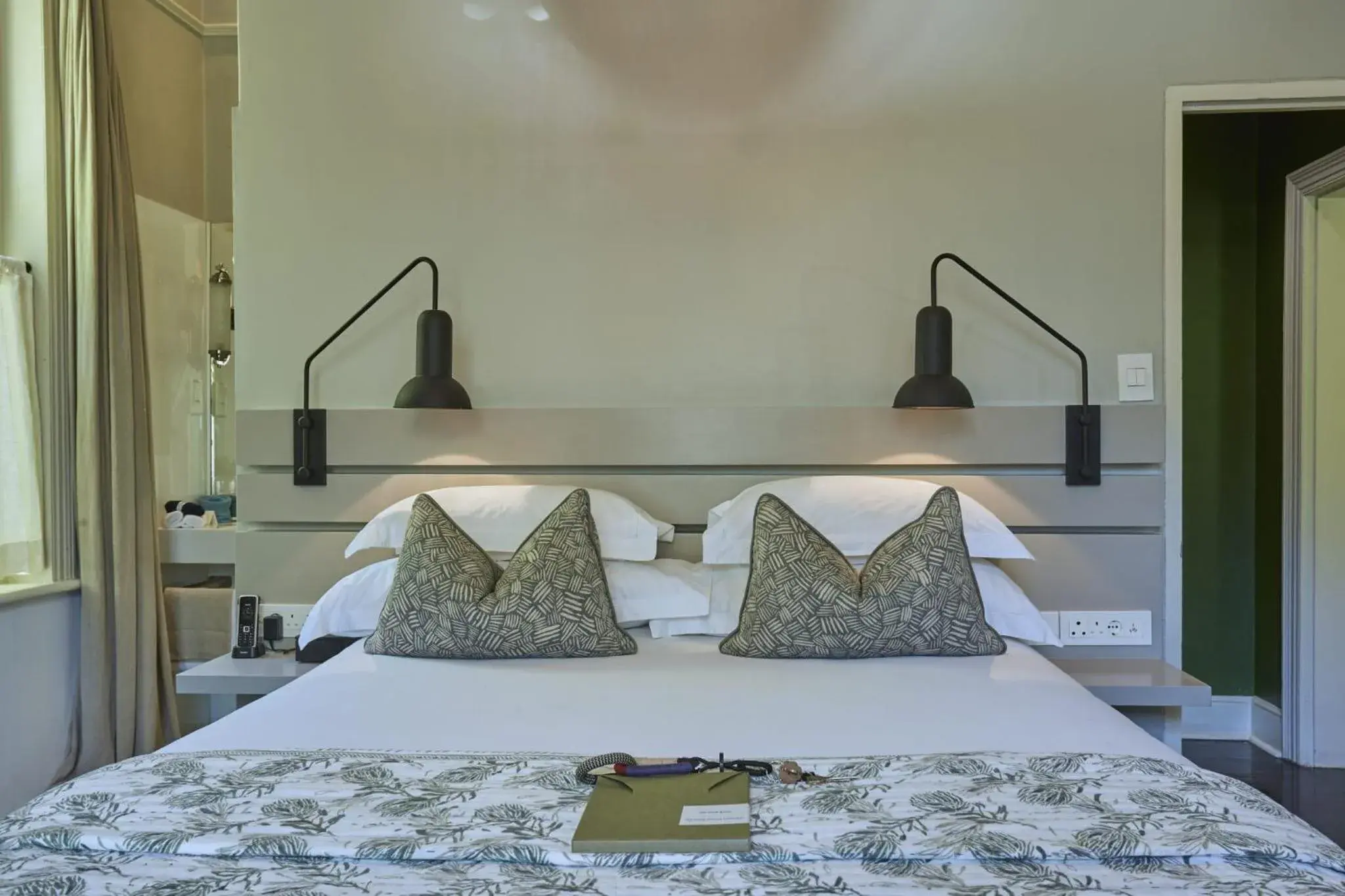 Bed in The Robertson Small Hotel and Spa by The Living Journey Collection Bed in The Robertson Small Hotel and Spa by The Living Journey Collection