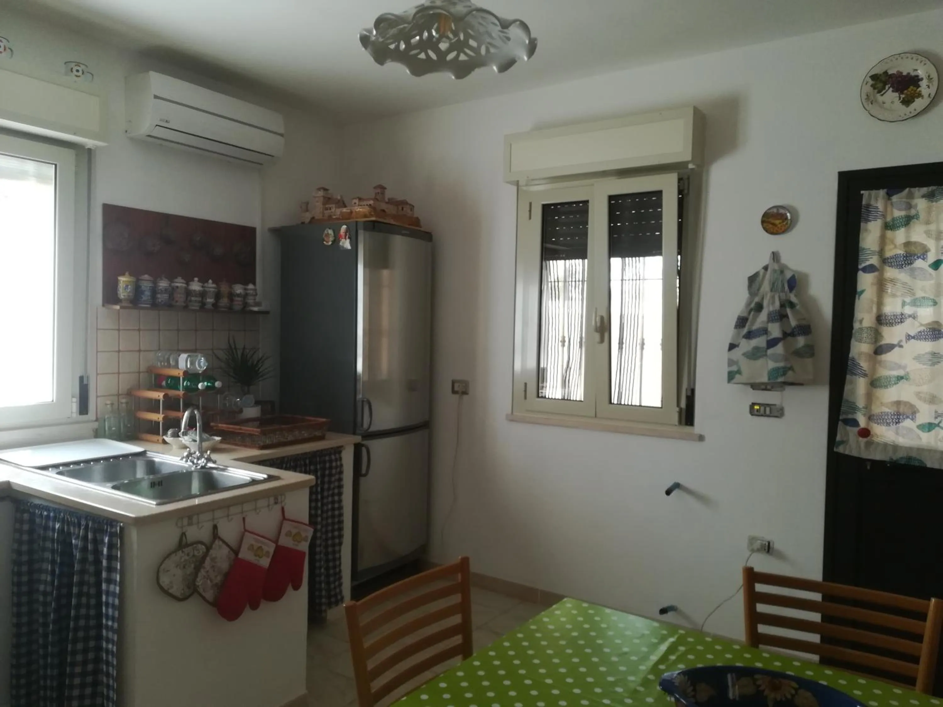 Kitchen or kitchenette in Trullo Alessandro e Villa Raffaela