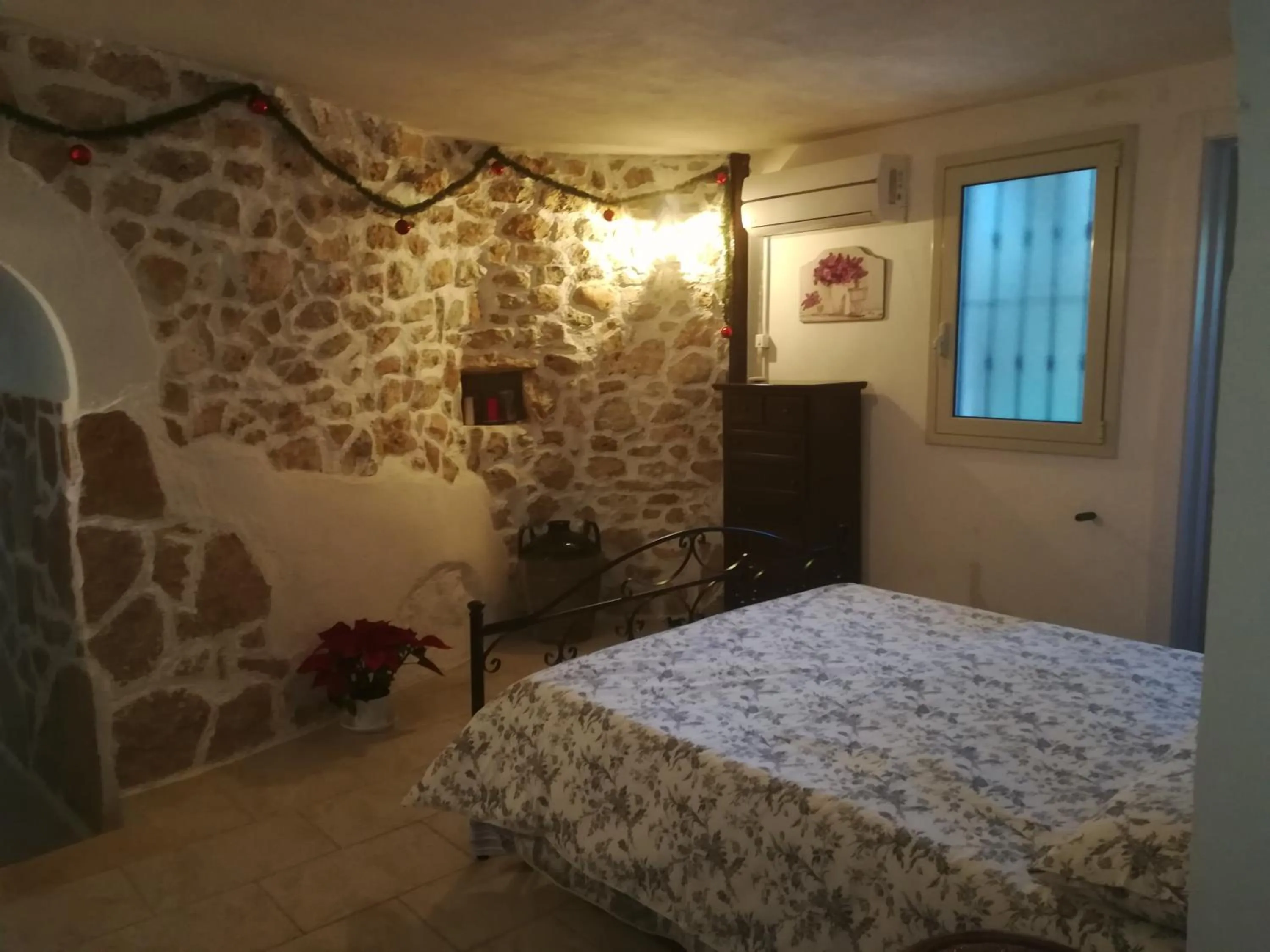 Photo of the whole room, Bed in Trullo Alessandro e Villa Raffaela
