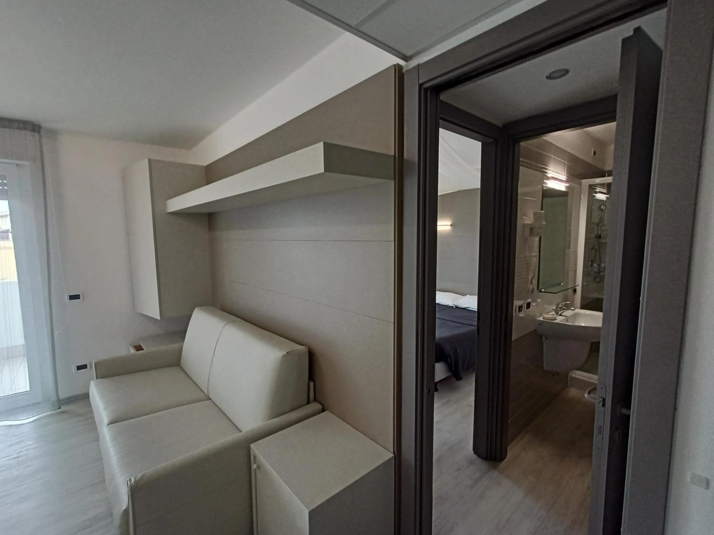 Living room, Bed in Hotel Residence Sanremo