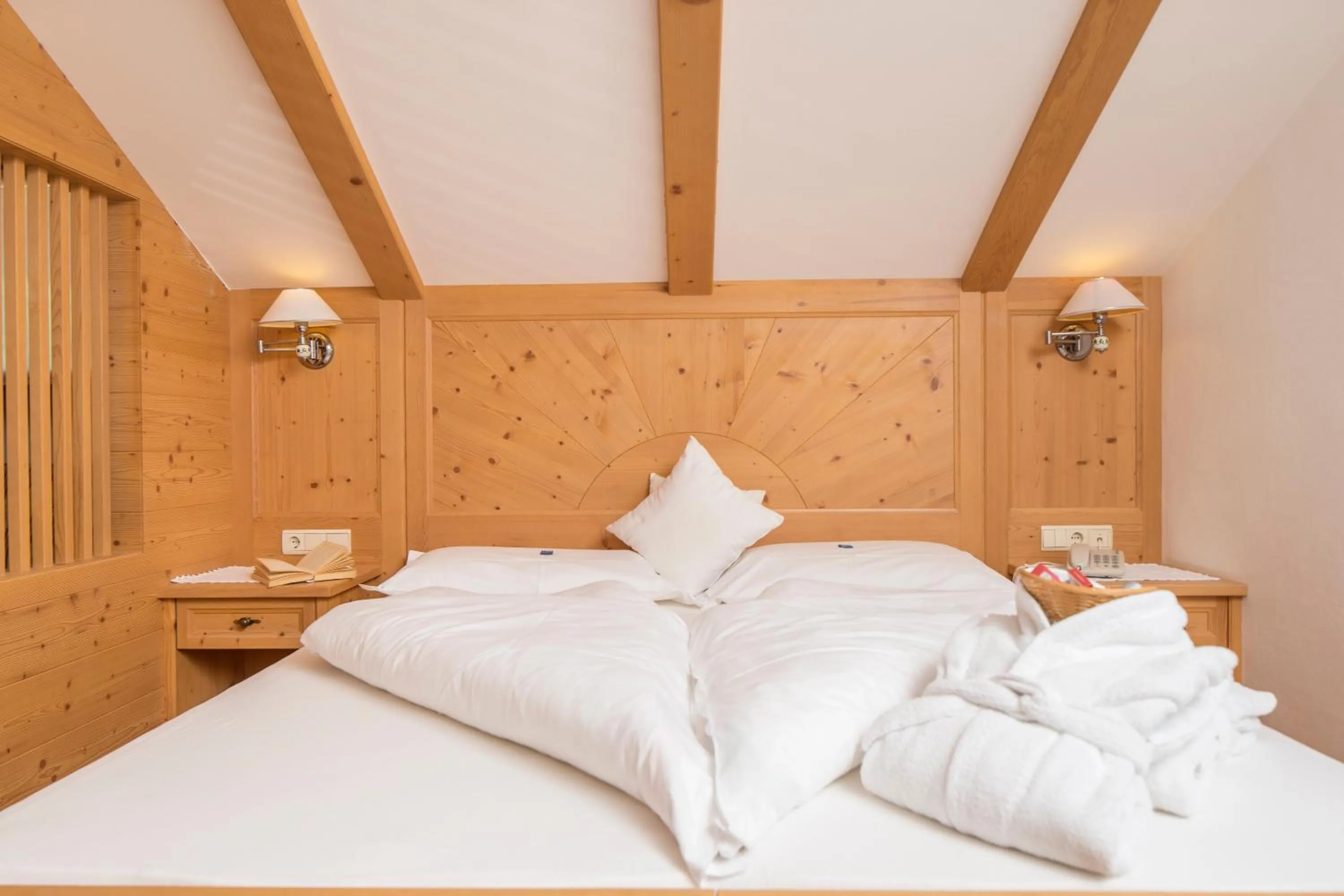 Bed in Naturhotel Miraval