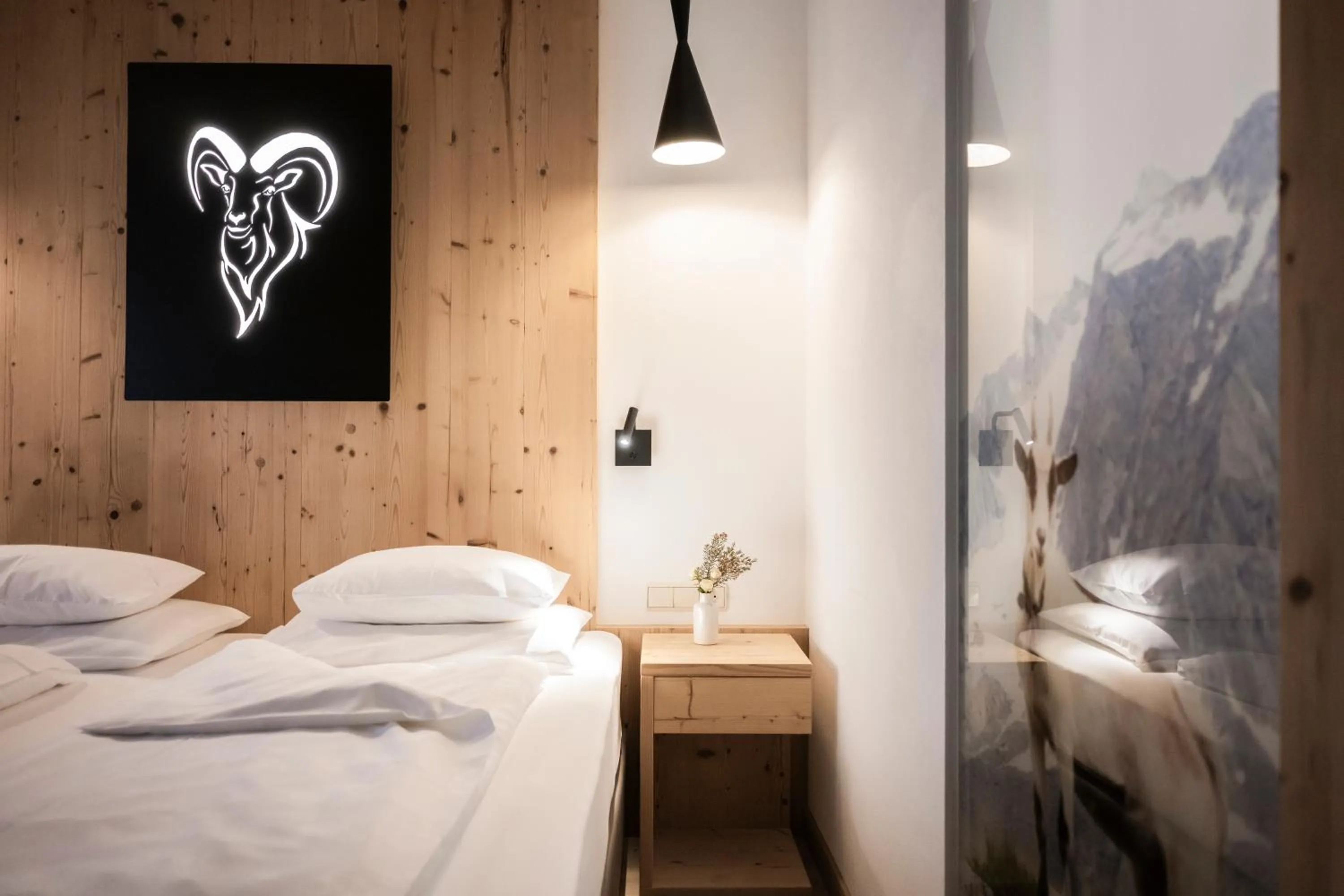 Bed in Naturhotel Miraval