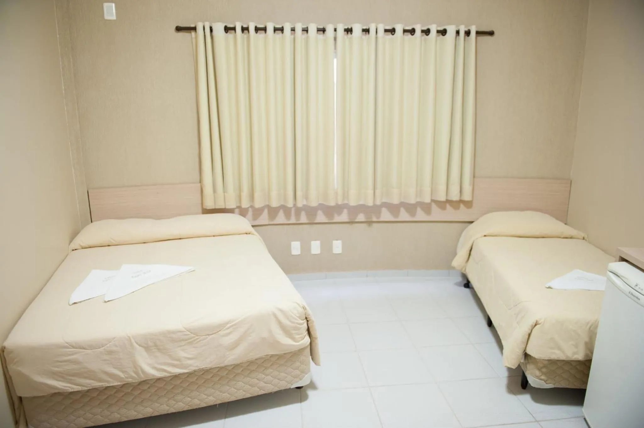 Bed in Italian Palace Hotel