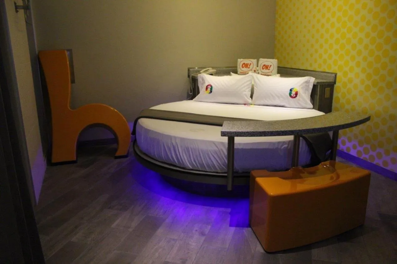 Bed in Oh! Oriente Hotel