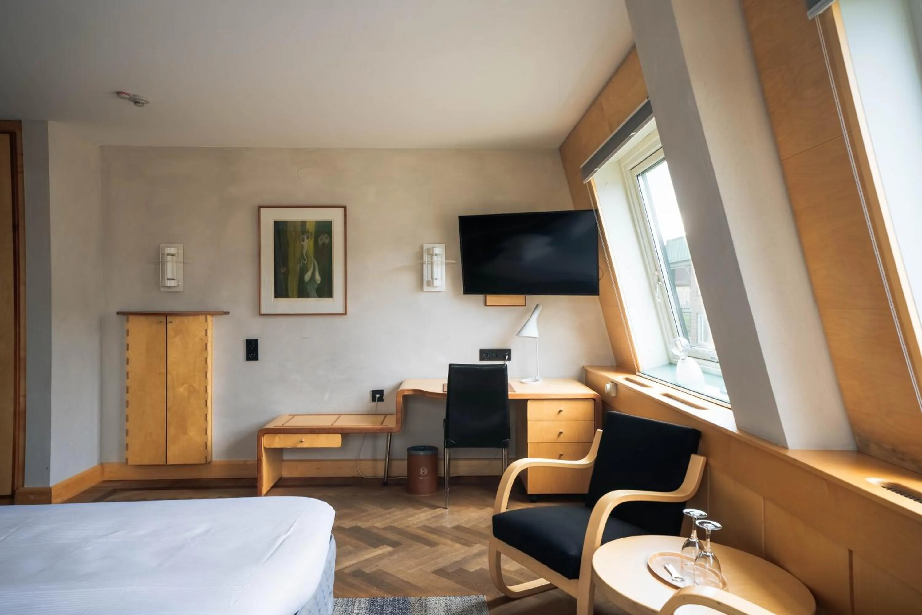 Seating area, Bed in Hotel Lundia