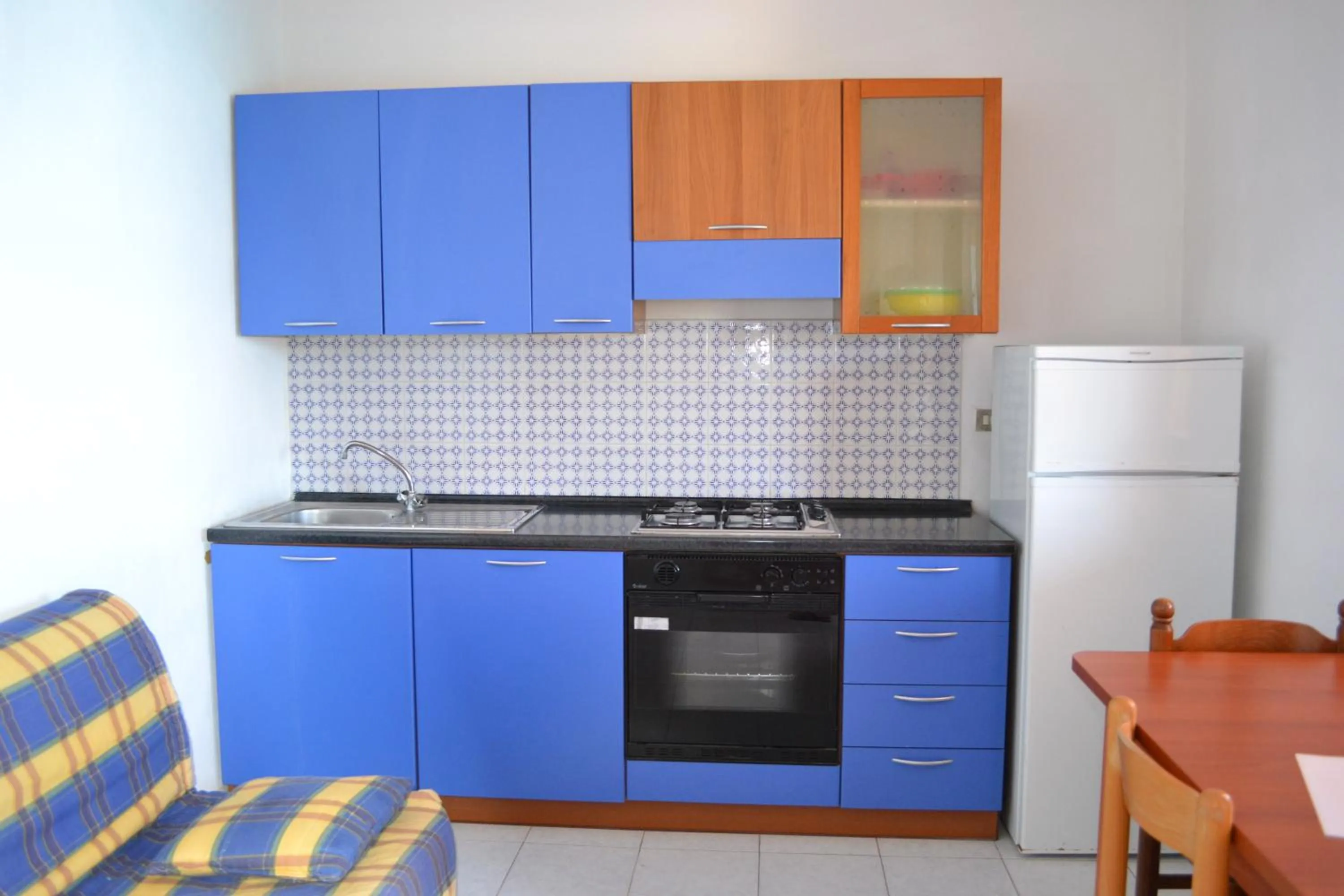 Kitchen or kitchenette in Villaggio Calispera