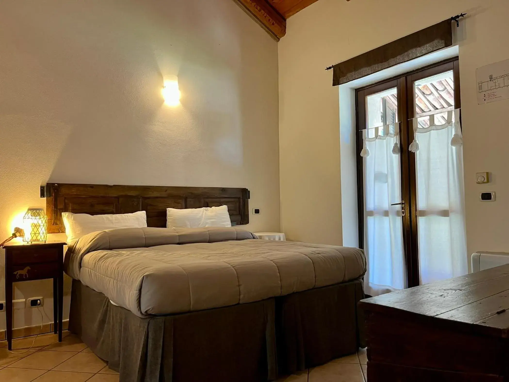Comfort Triple Room in La Cascina Del Castello Comfort Triple Room in La Cascina Del Castello