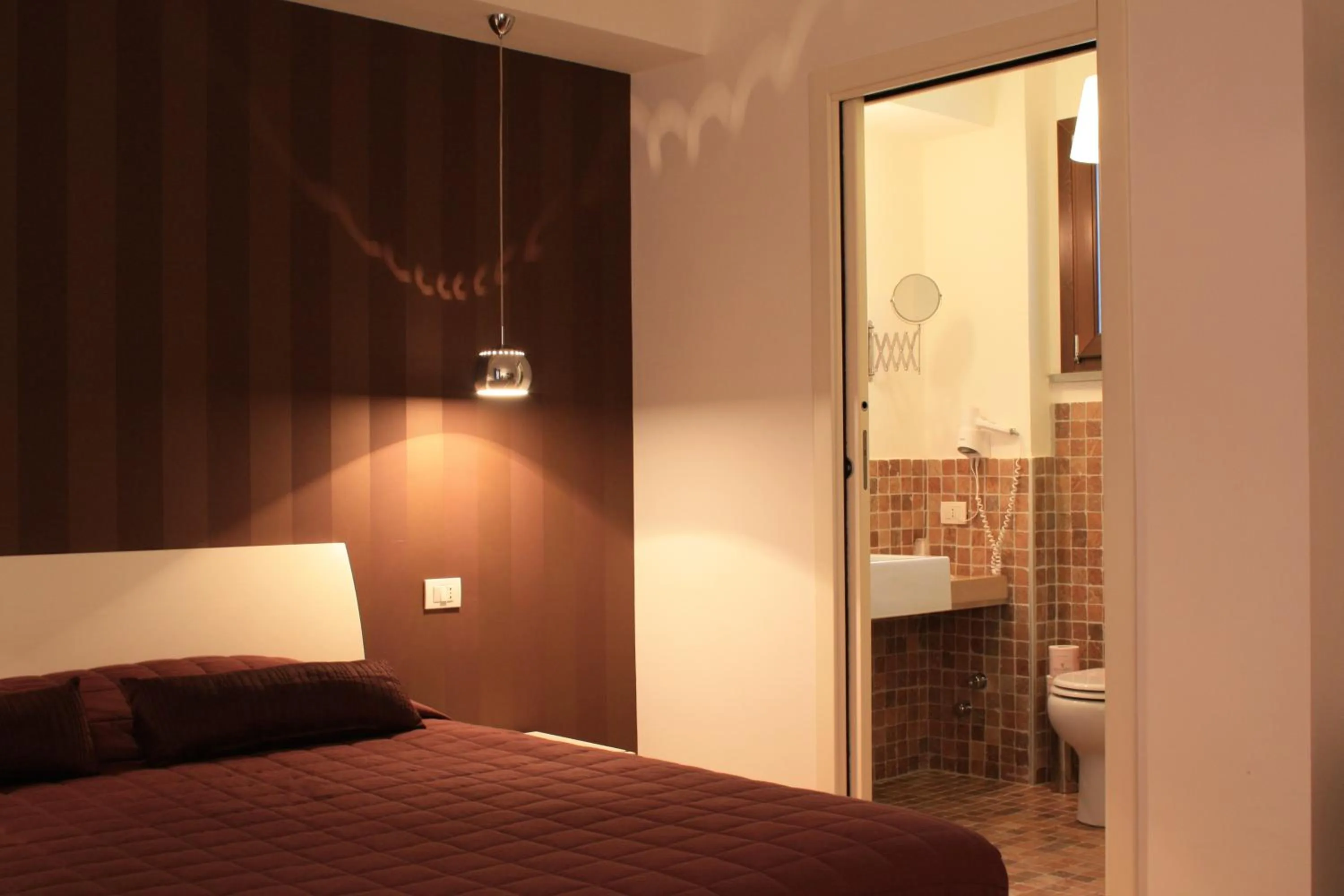 Bed in Belmonte Hotel, Dependance Alba Palace Hotel