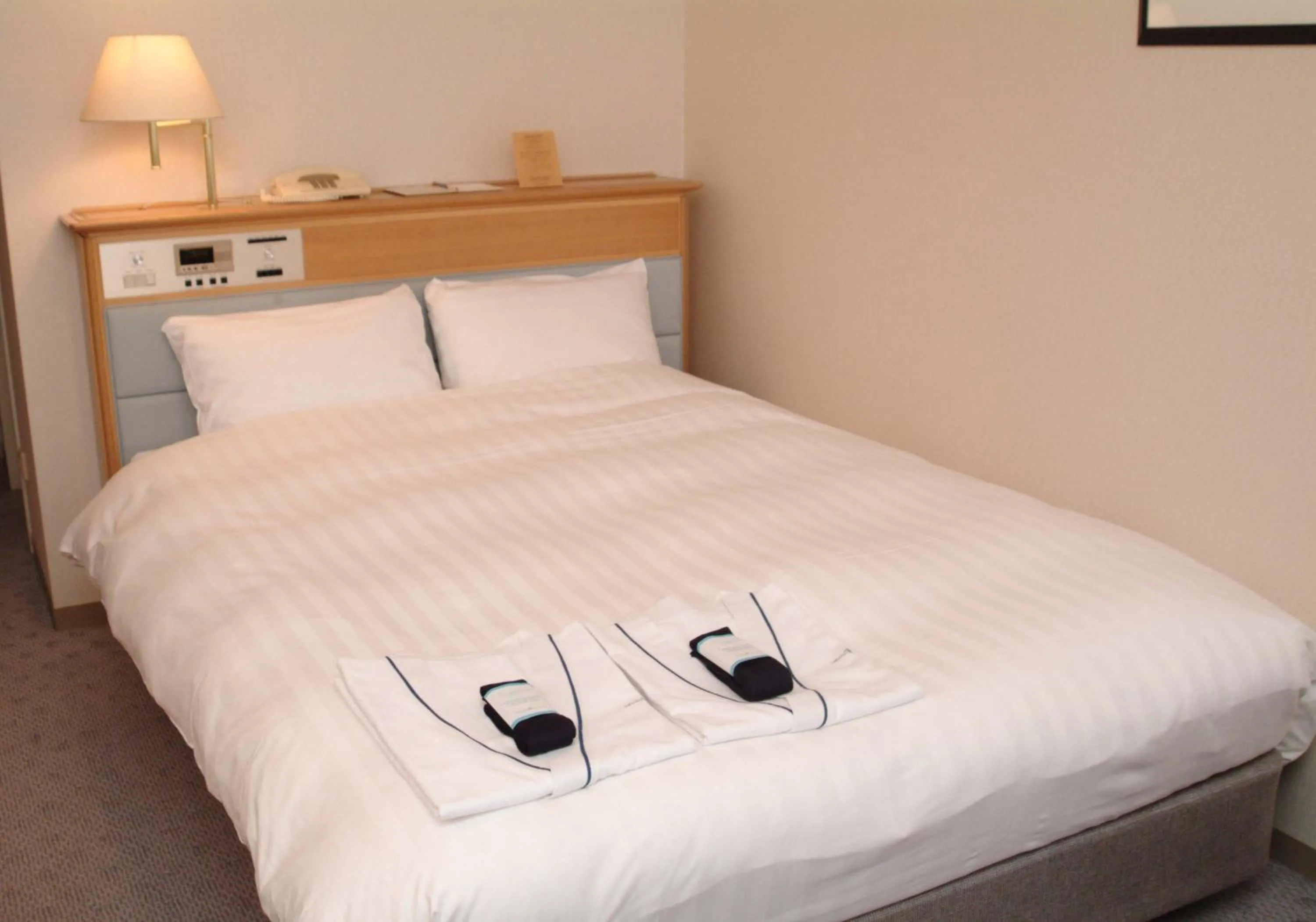 Bed in Hotel Hamatsu