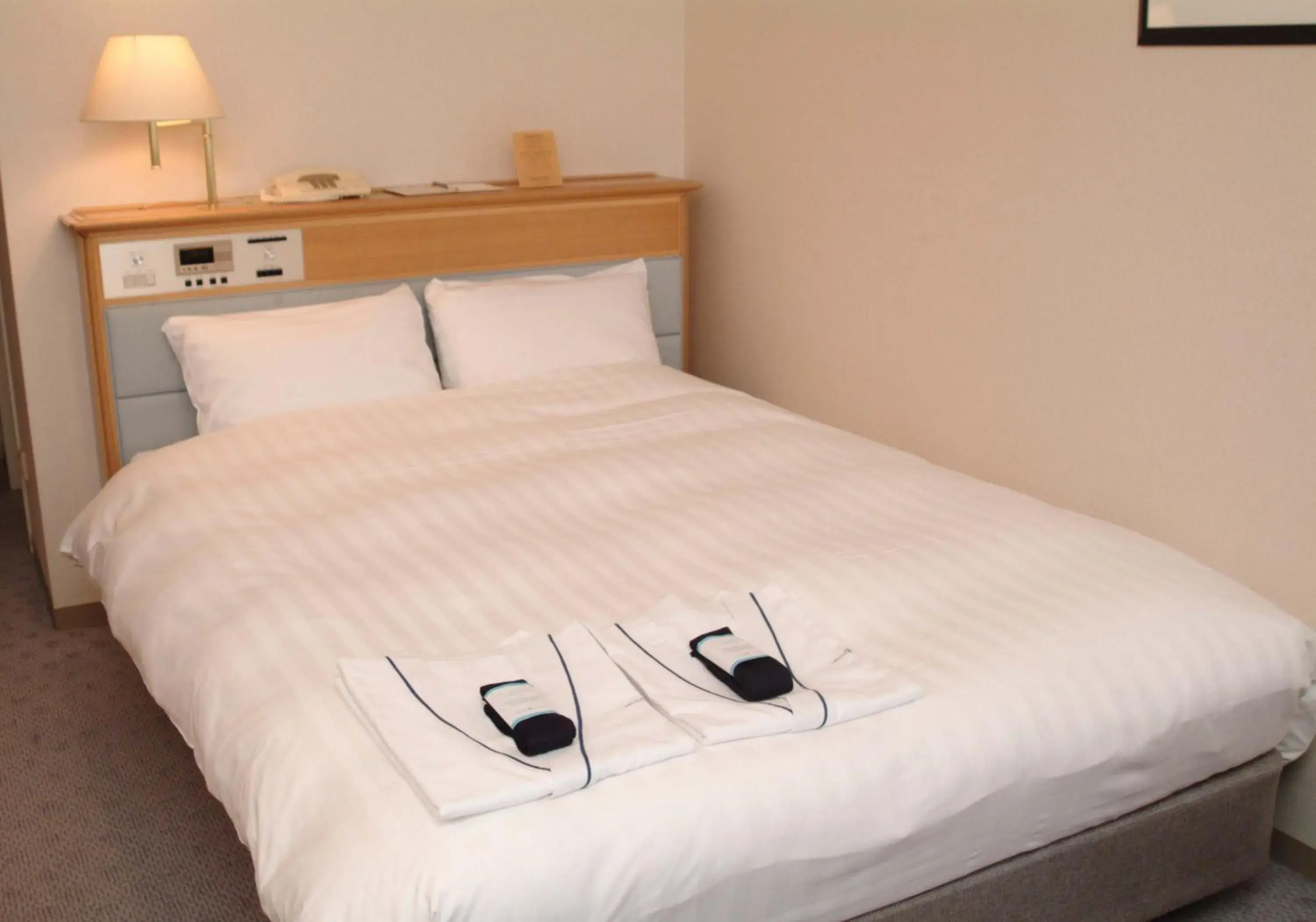 Bed in Hotel Hamatsu Bed in Hotel Hamatsu