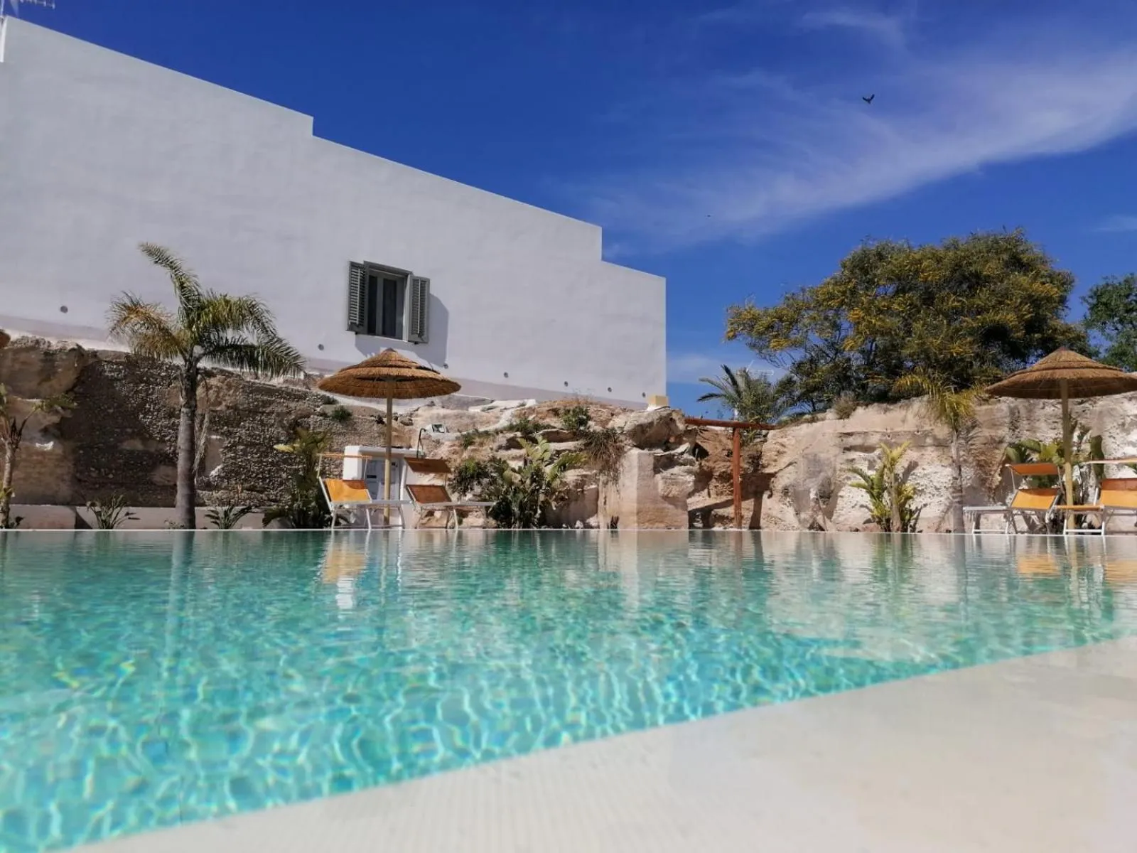 Swimming pool in L'Oasi Villaggio Albergo