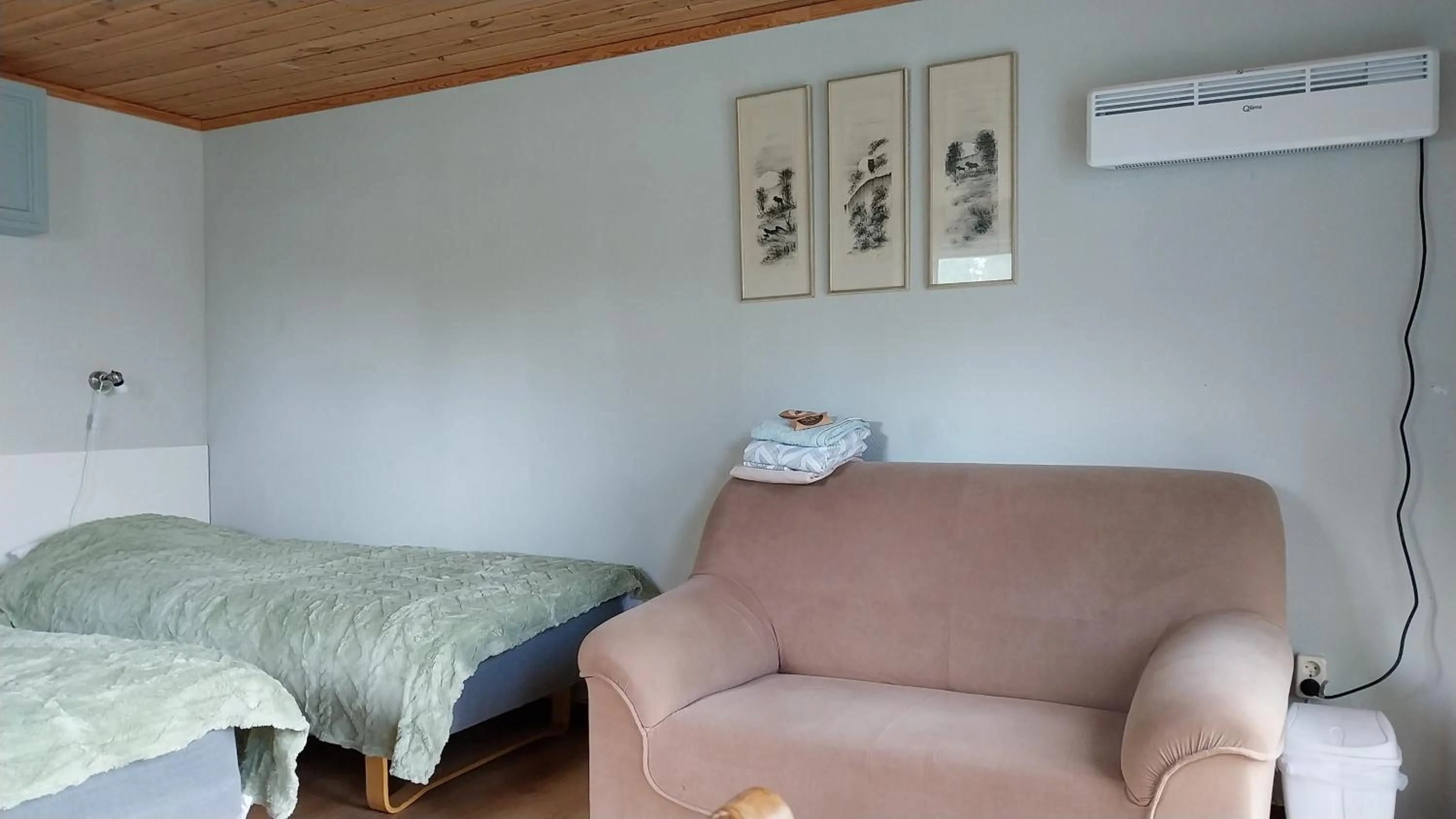 Bed in Lillvikens Gästhuset och Stugor