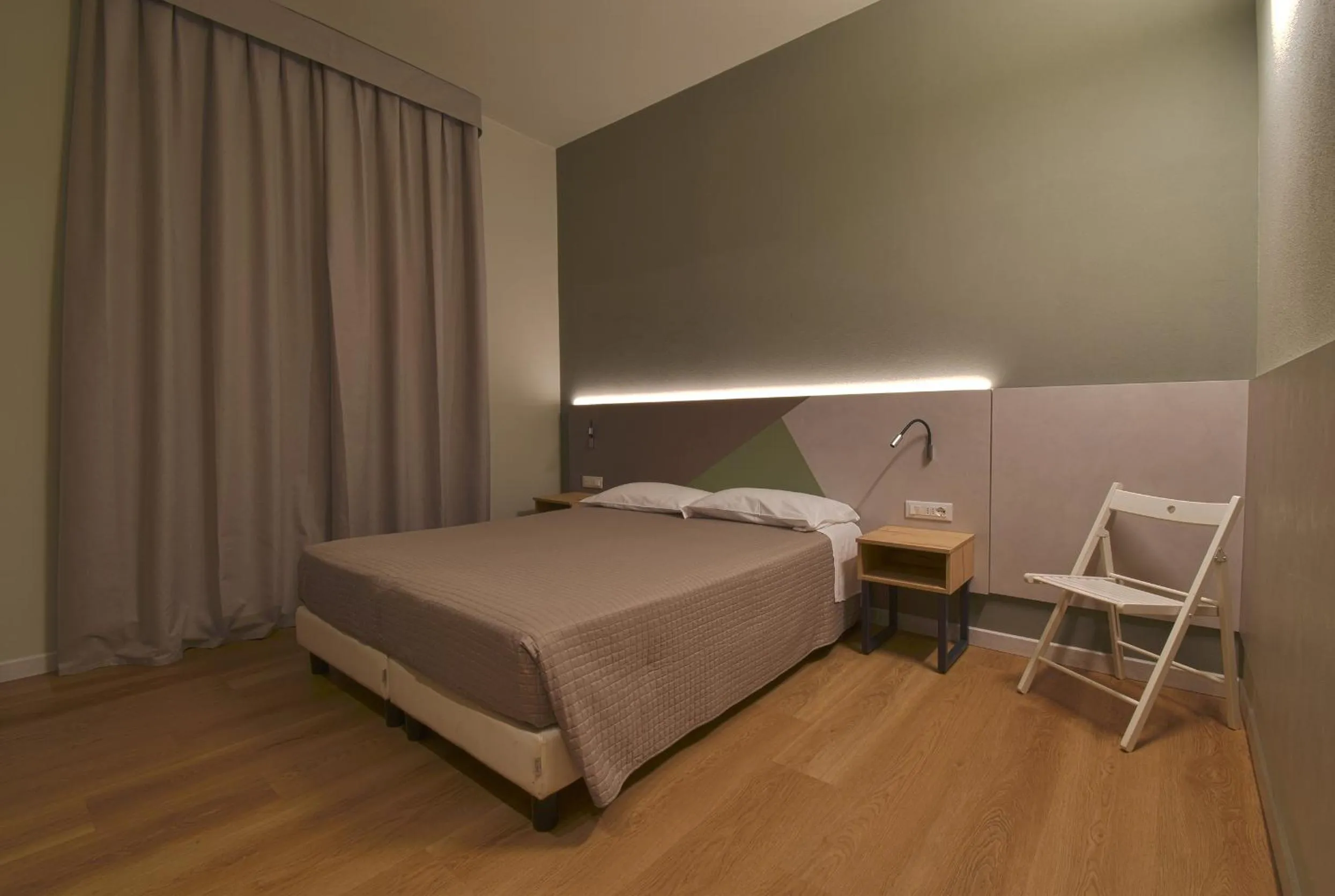 Bed in Hotel Columbia