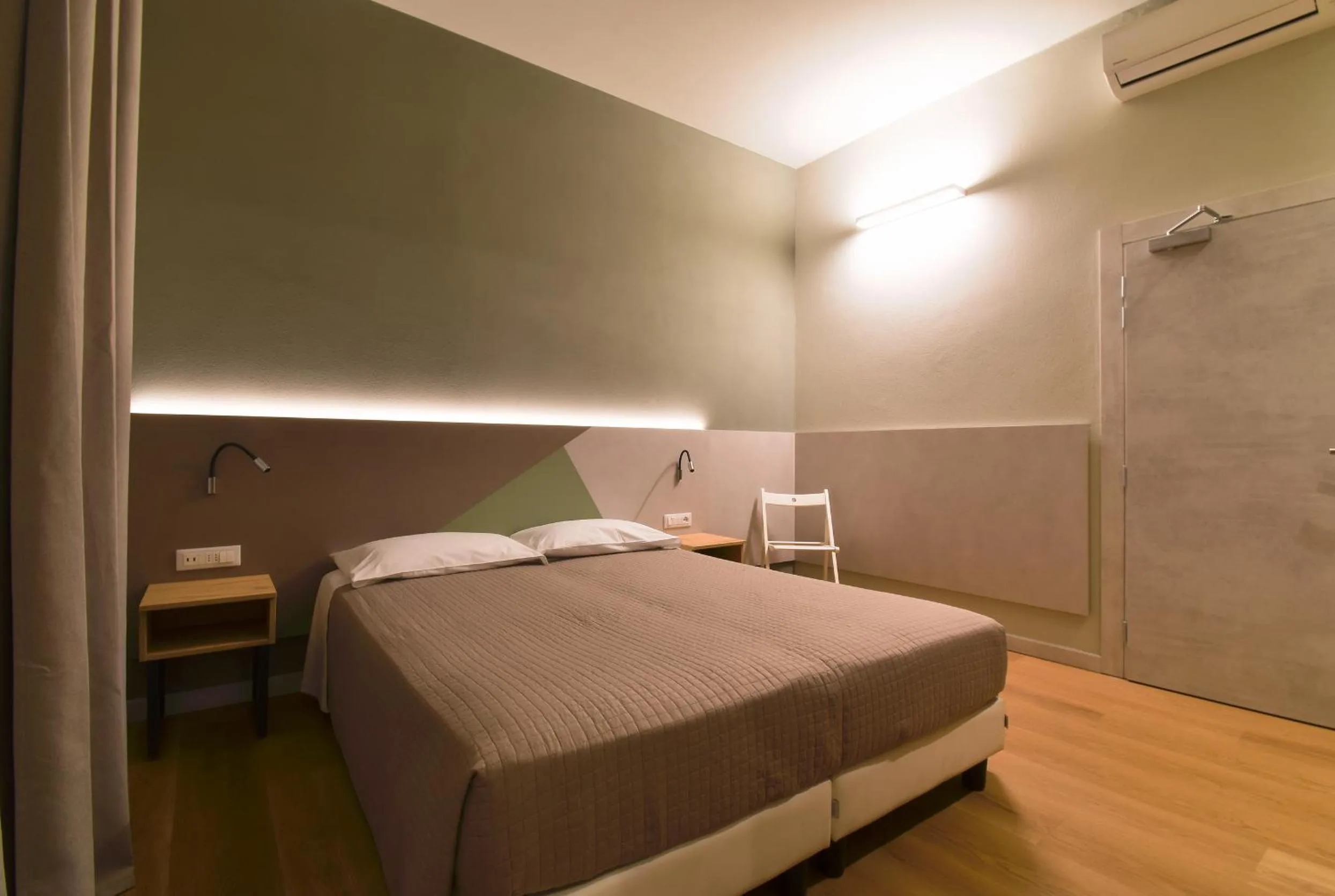 Bed in Hotel Columbia